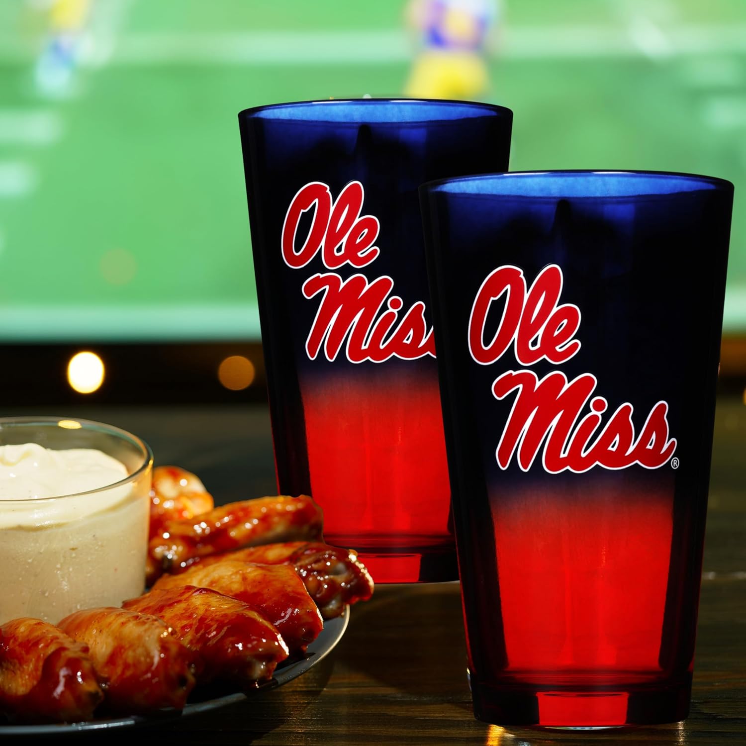 The Memory Company Officially Licensed NCAA 2-Pack 16oz Ombre Pint Glass Set Team Logo Barware Collection for Game Day Celebrations and Home Bar