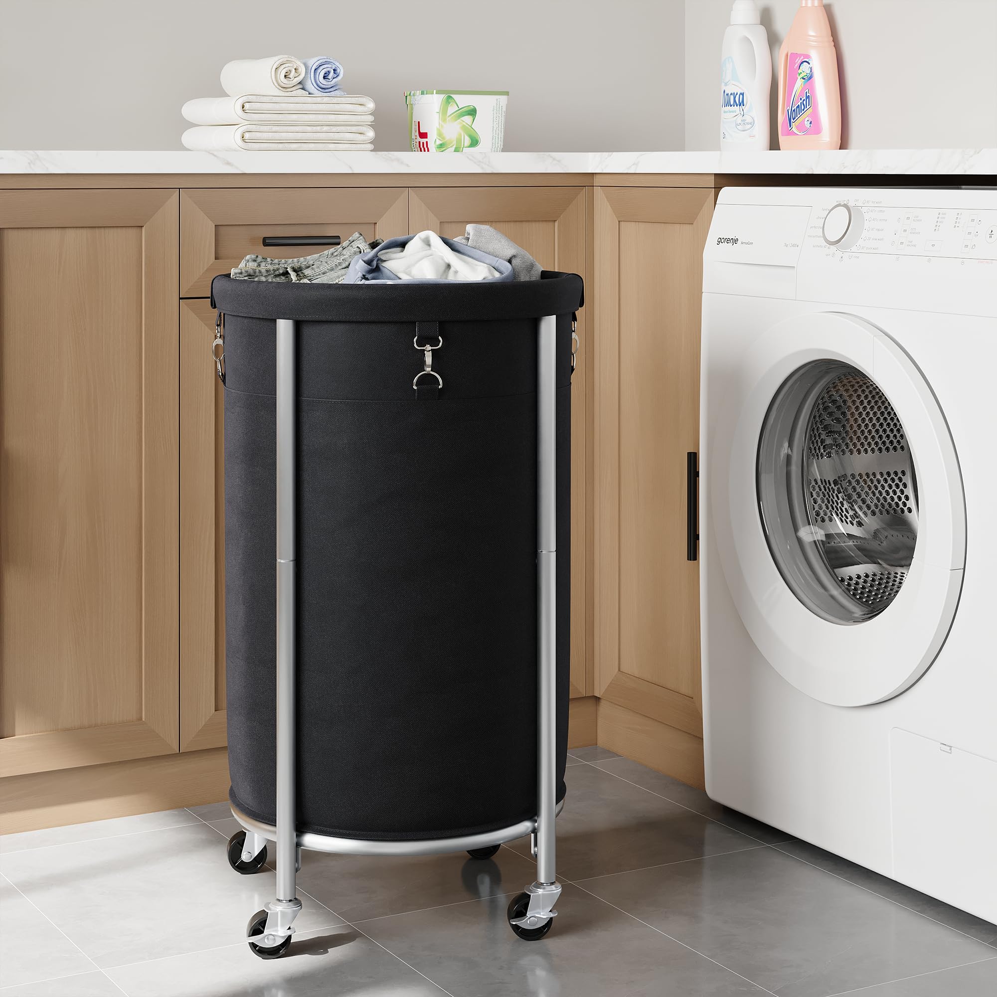 ELYKEN Cesto portabiancheria con ruote, 110 l, cesto portabiancheria rotondo con telaio in acciaio e borsa rimovibile, 4 ruote e 2 freni, cesto per vestiti sporchi per hotel, dormitorio, nero