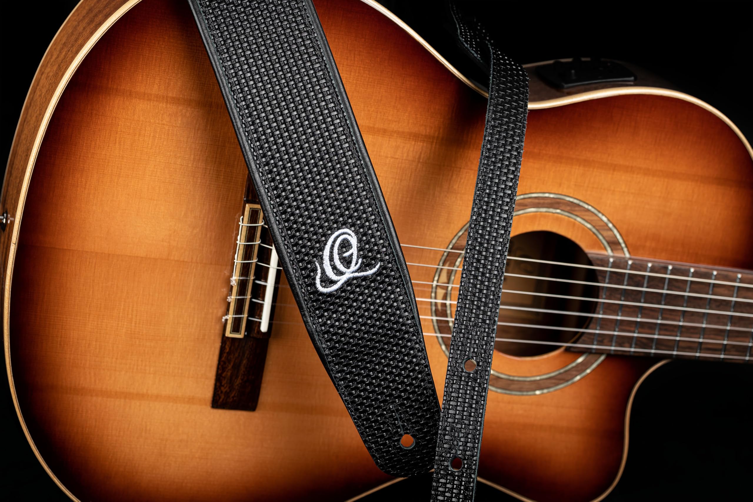 Ortega Guitars Gitarrengurt Länge Verstellbar - Akustik Gitarre / Bass, E-Gitarre, E-Bass - Custom Series - Echtleder, Black Braid (OSCU-4)