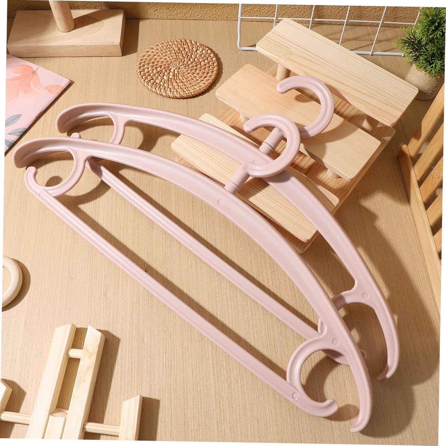 10pcs Nonslip Clothes Hangers with Wide Shoulders for Closet Prevent Shoulder Bumps Space-Saving Organizer for Coats Jackets Dresses Pants Pink