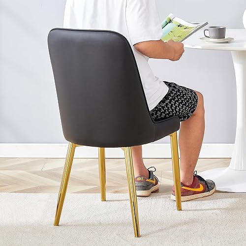 Vista 6 de Modernos juegos de sillas de comedor y mesa y sillas con cojines gruesos, patas de metal negro con detalles dorados, juego de 8 piezas