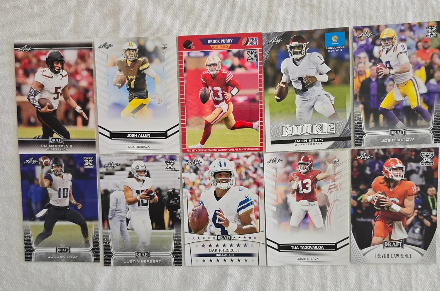 Patrick "Pat Mahomes Josh Allen Joe Burrow Jalen Hurts Dak Prescott Brock Purdy Justin Herbert Jordan Love Tua Tagovailoa Trevor Lawrence Huge 10 Card Rookie Football Lot Leaf Superstar Quarterbacks! You Will Receive All 10 Cards