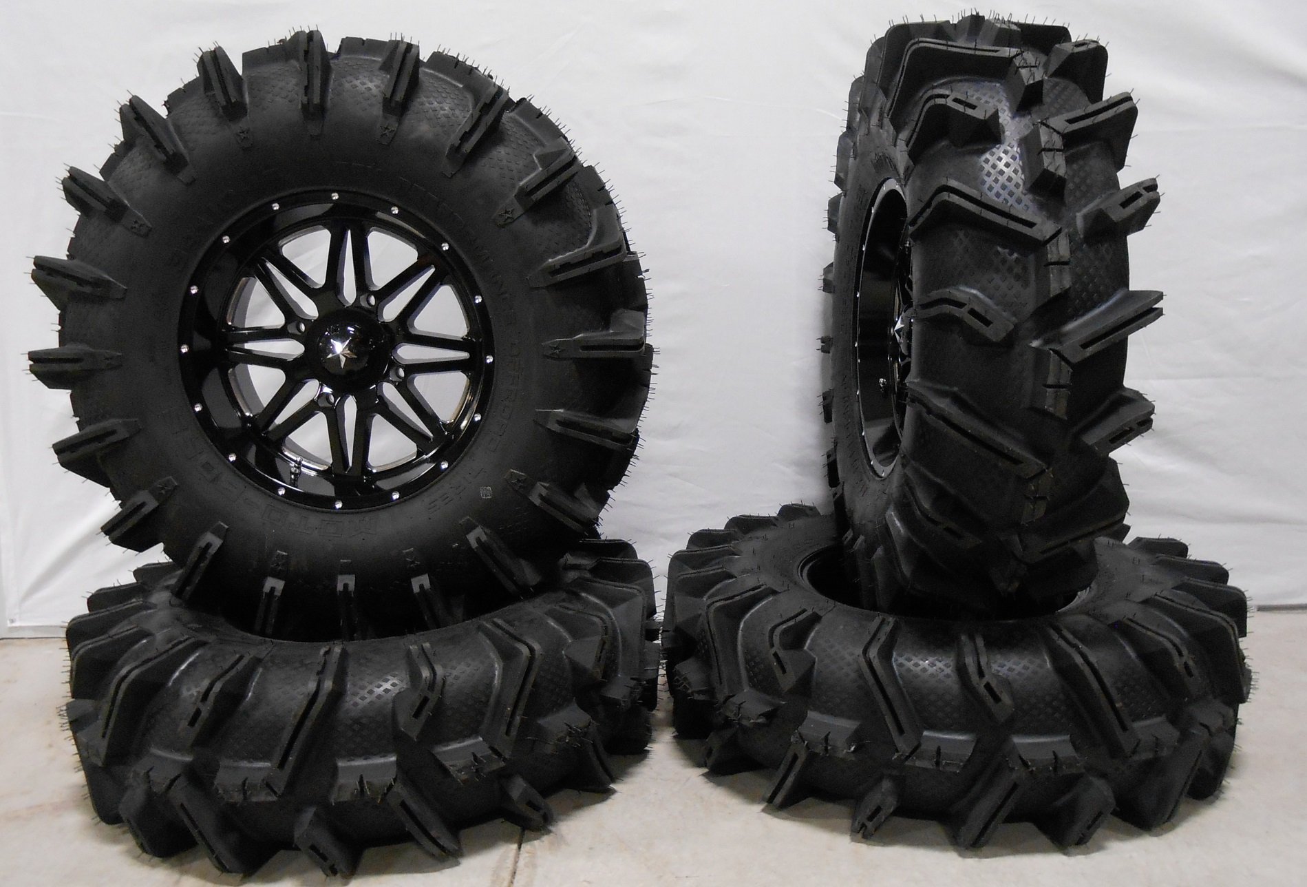 Bundle - 9 Items: MSA Black Vibe 16" UTV Wheels 34" MotoBoss Tires [4x137 Bolt Pattern 12mmx1.5 Lug Kit]