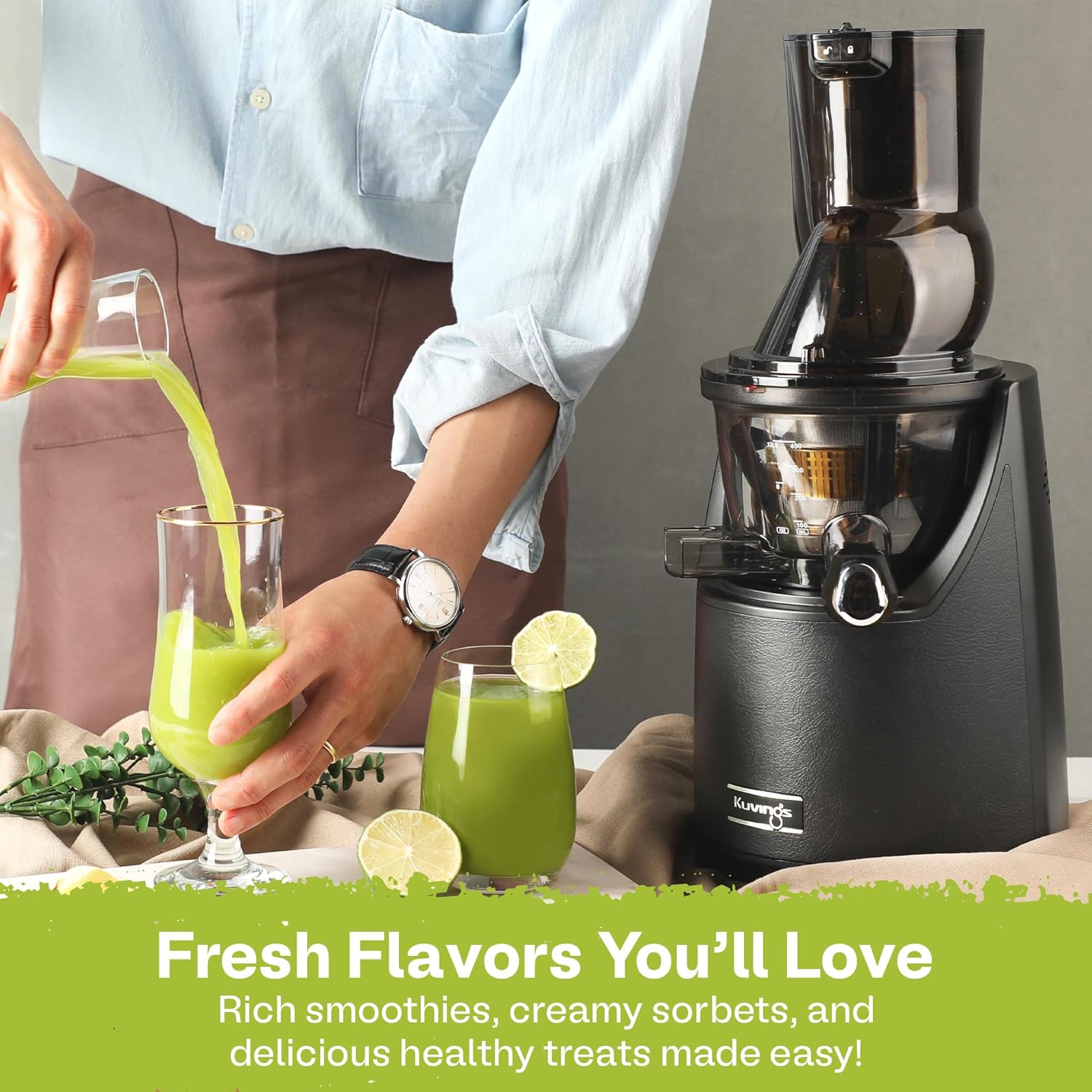 Freshly pressed green juice being poured from the Kuvings EVO820GMS Whole Slow Juicer into a glass.