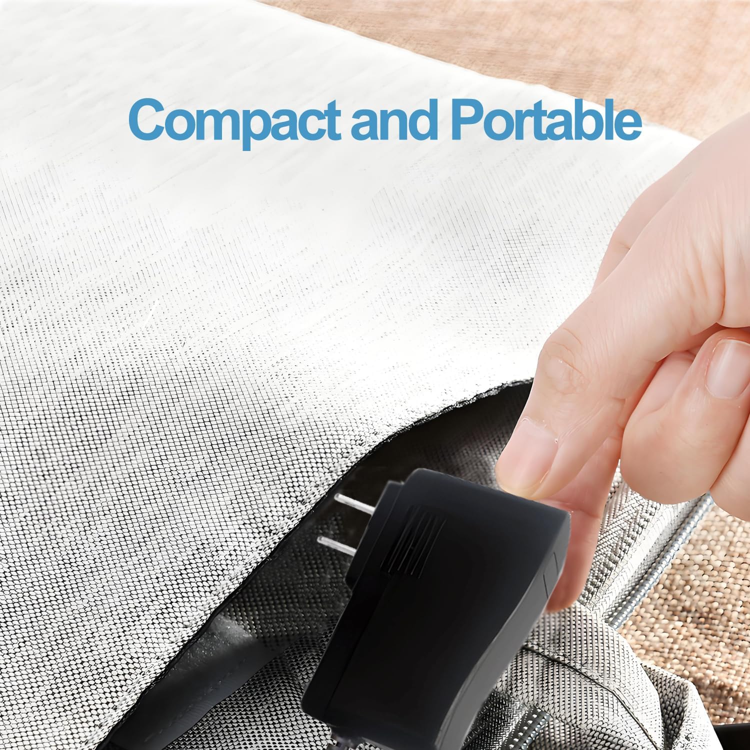 A hand placing the compact Hanorld AC Power Adapter into a bag, illustrating its portability.