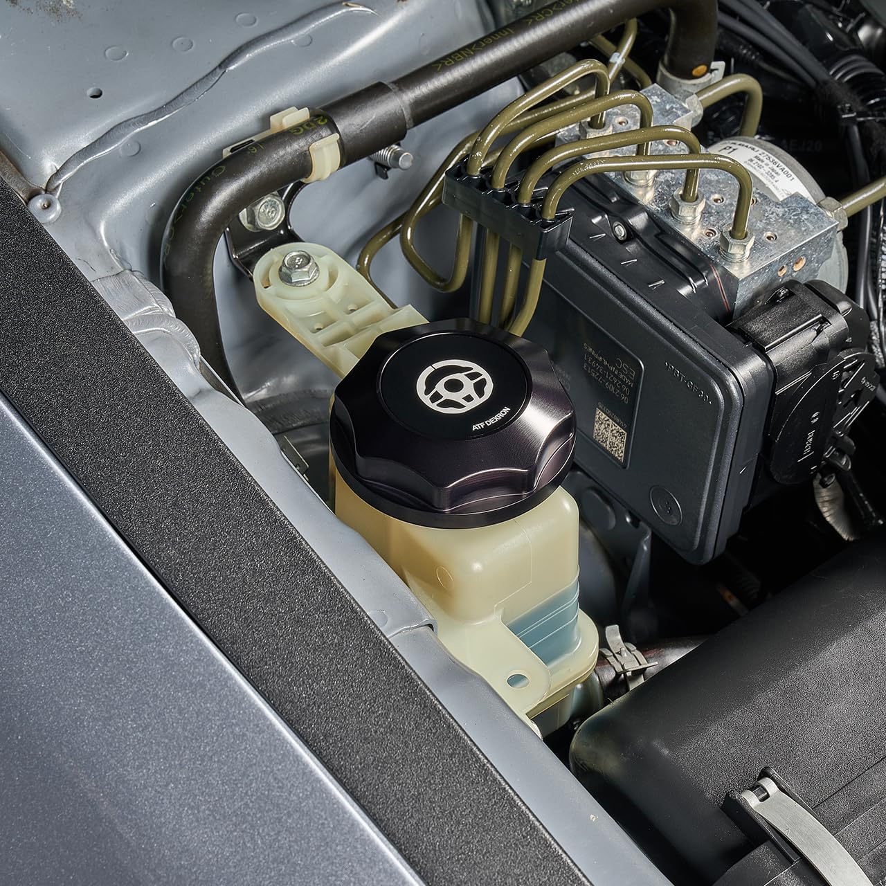 IAG Revolve Power Steering Reservoir Cap w/Anodized Color Accent for Subaru 08-14 WRX, 08-21 STI, 05-09 LGT (Black)