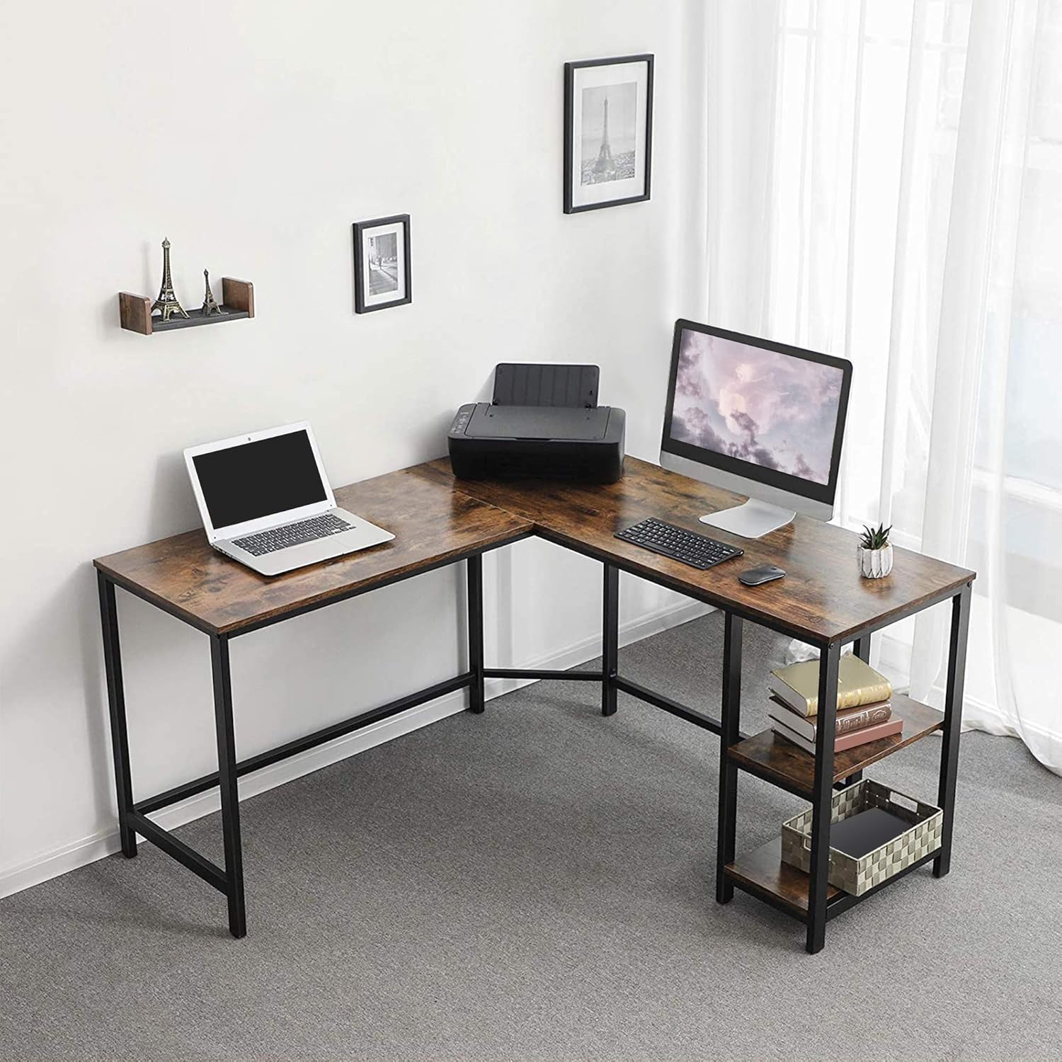 The Urban Port L-Shape Computer Desk in a room setting with a laptop and monitor