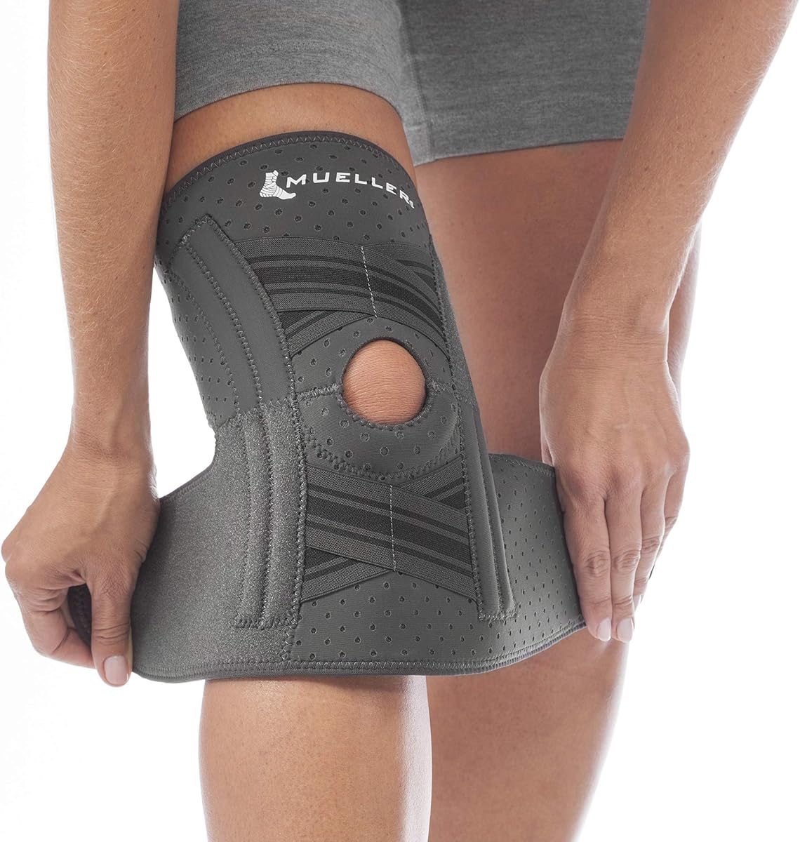 Mueller Sports Medicine Comfort Plus Estabilizador de rodilla autoajustable, soporte para aliviar el dolor de rodilla para hombres y mujeres, ideal para artritis, esguinces, negro,