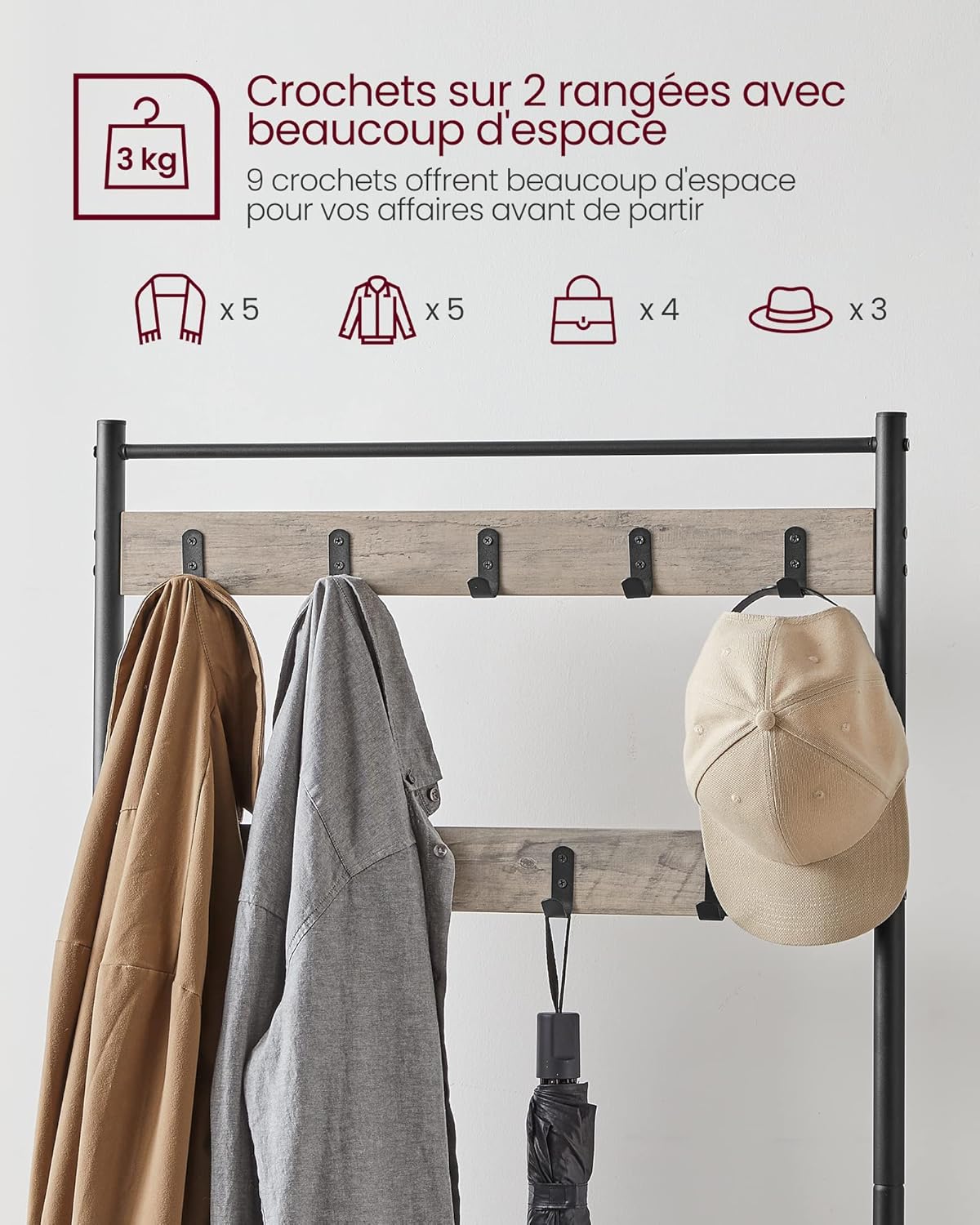 Close-up of coat hooks with hat, jacket, and umbrella