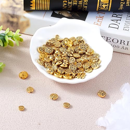 Miniatura 7 de Craftdady 160 cuentas espaciadoras redondas planas de oro antiguo de 0.394 a 0.472 pulgadas (0.236-0.472 in) de metal tibetano, cuentas sueltas para