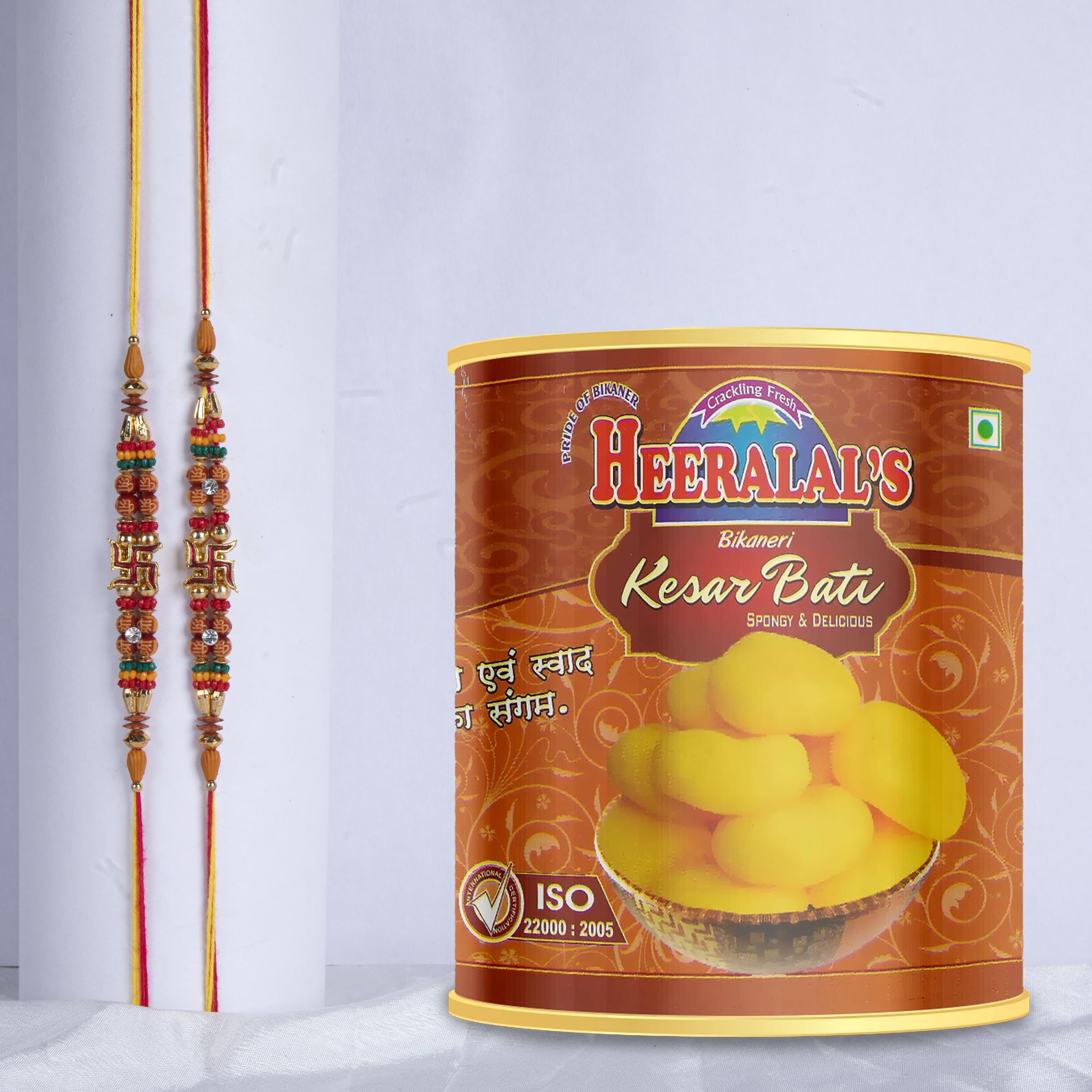 Heeralal's Rakhi Gift Pack – 2 Rakhi with 1Kg Bikaneri Kesar Bati Tin (20 pcs), Soft & Flavourful, Ideal for Raksha Bandhan Celebration-image-41
