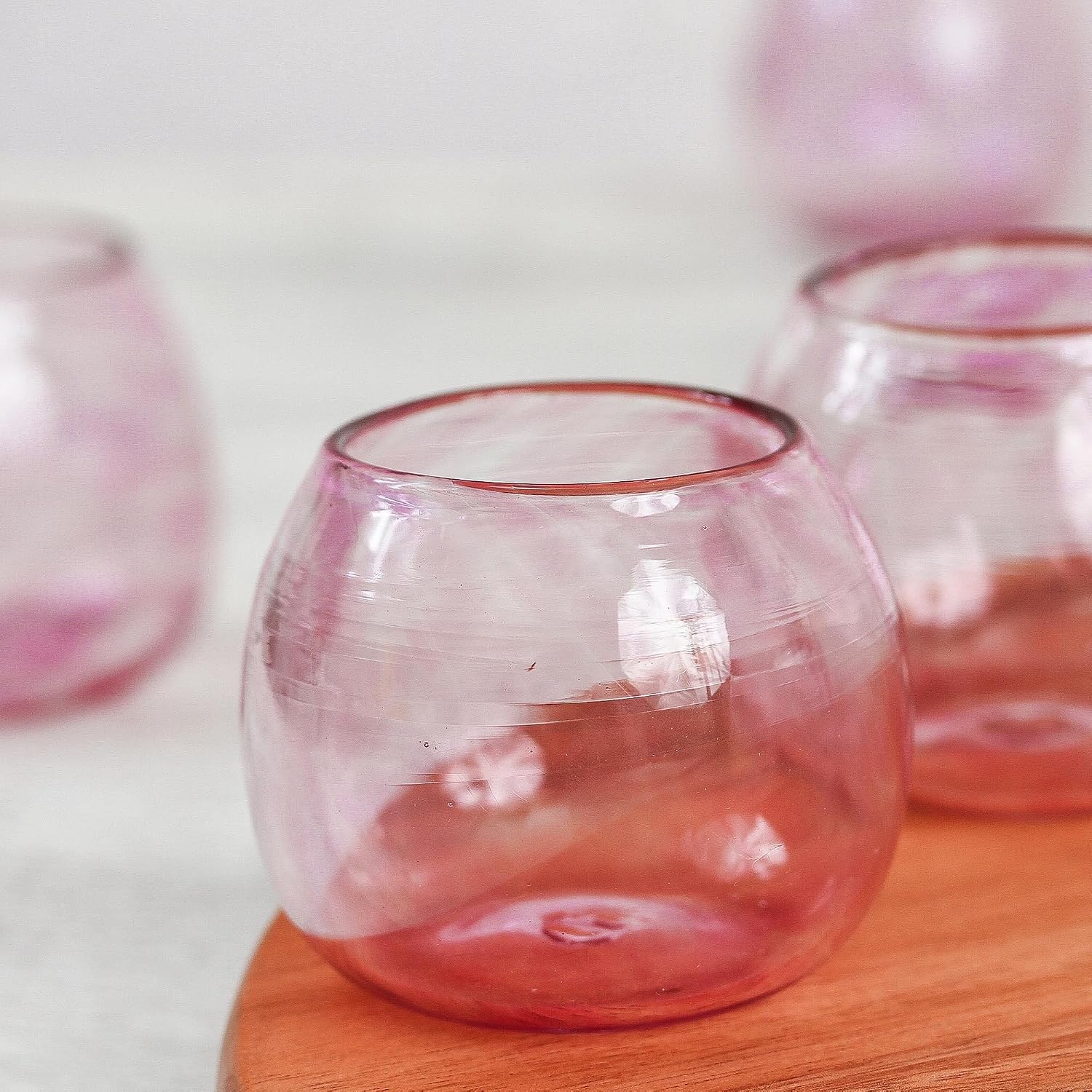 NOVICA Artisan Handmade Recycled Glass Stemless Wine Glasses Six Pink from Mexico Clear Tableware Drinkware Handblown [ 2.6in H x 3.1in Diam. 7 Oz.] ' Social Bliss in Rose' Set of 6