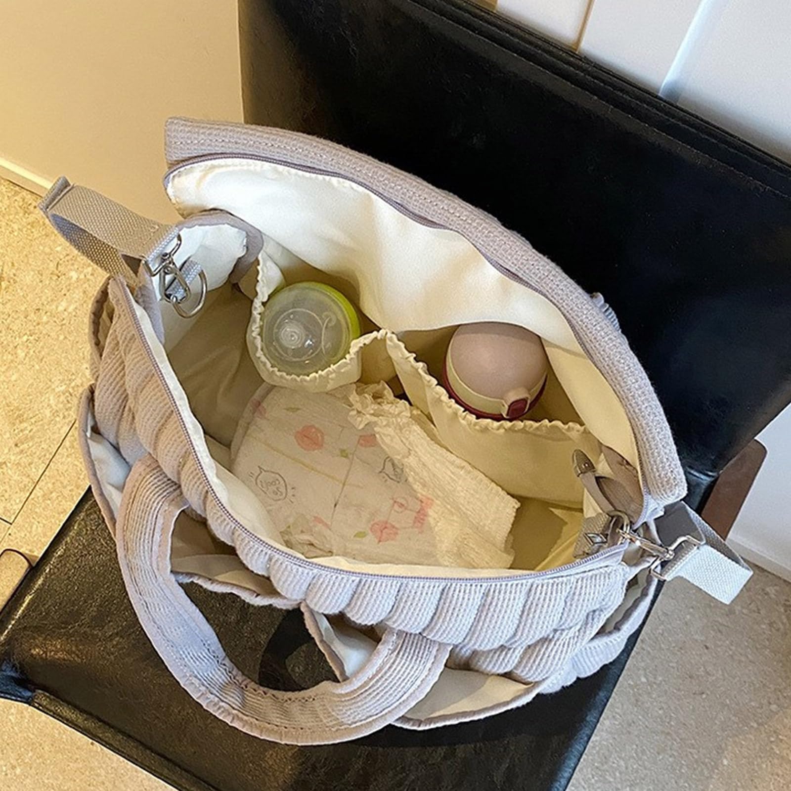 Borsa da viaggio multifunzionale da appendere al passeggino con tasche multiple per pannolini e biberon