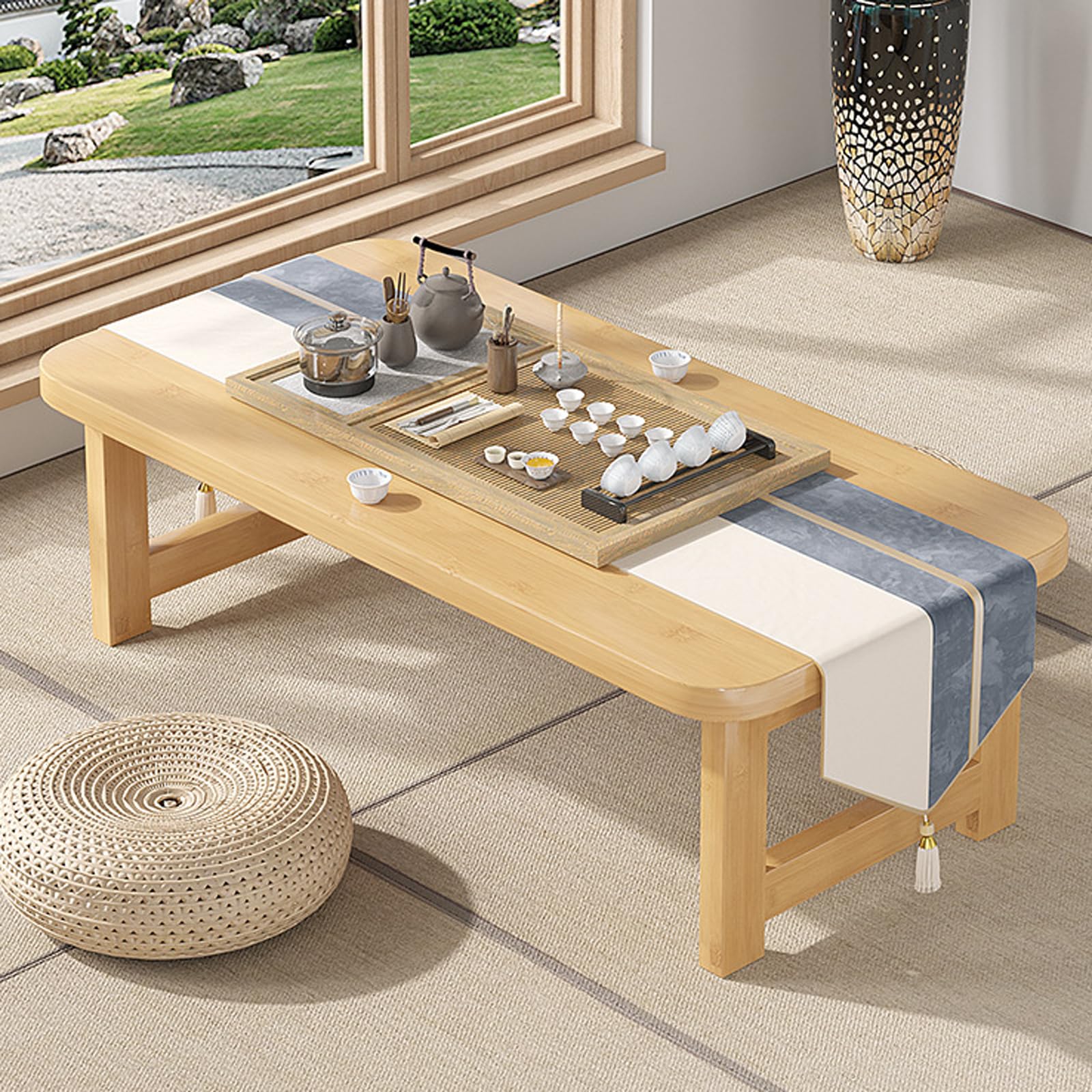 Table basse japonaise pliable pour optimiser les studios et petits salons