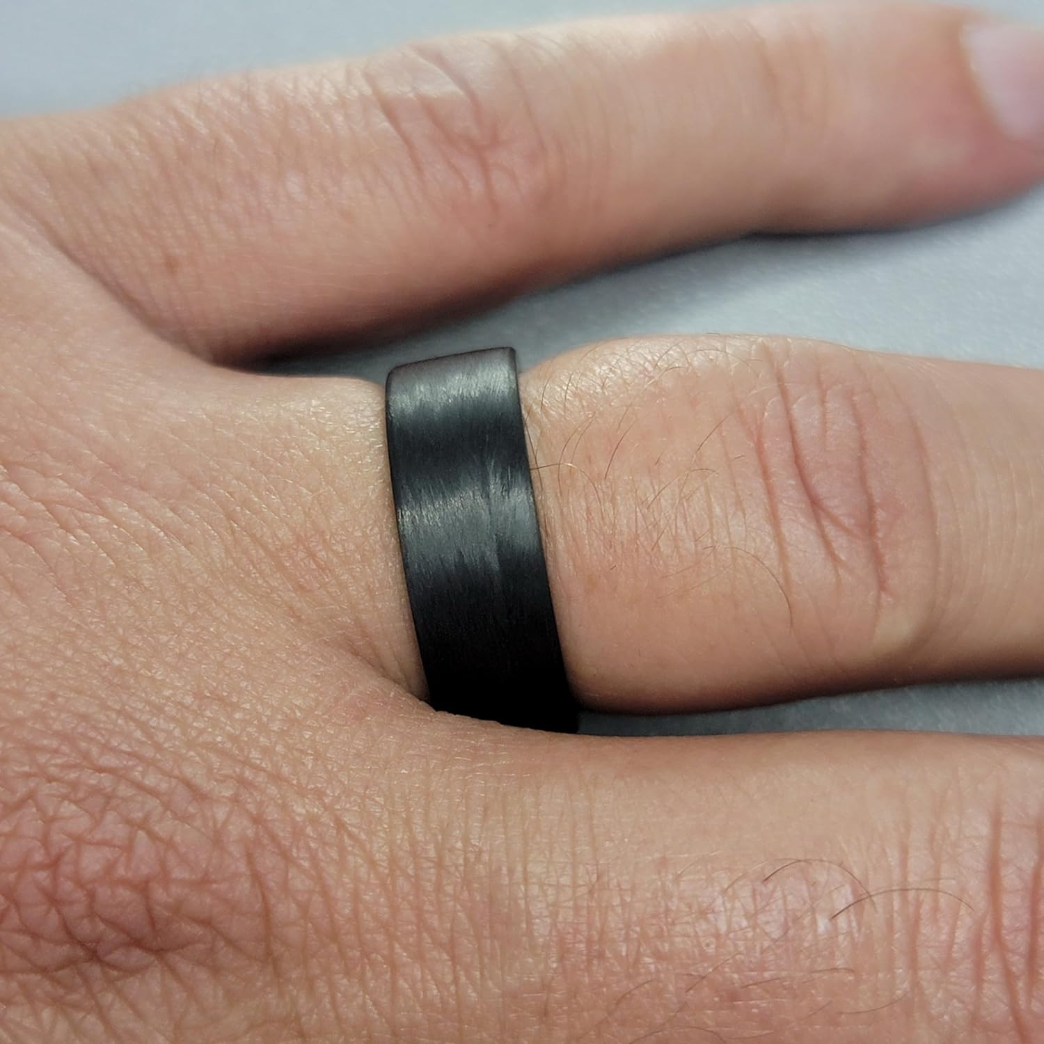Carbon Fiber Ring with Texalium Interior, Matte Finish, Durable, Scratch Resistant, Waterproof, Sizes 4-16, Custom Band Widths, Made in USA