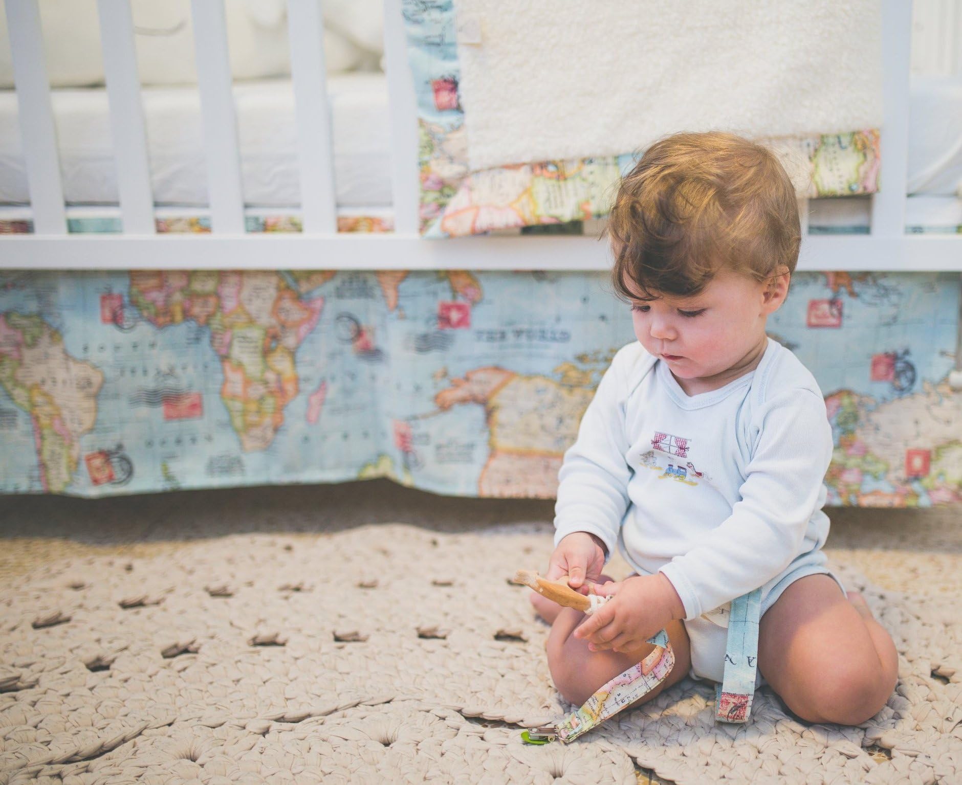 Crib Skirt - Handmade for a Baby Bedding with a world map fabric. Welcome to the world little one! Perfect for an Adventure or Travel theme Nursery.