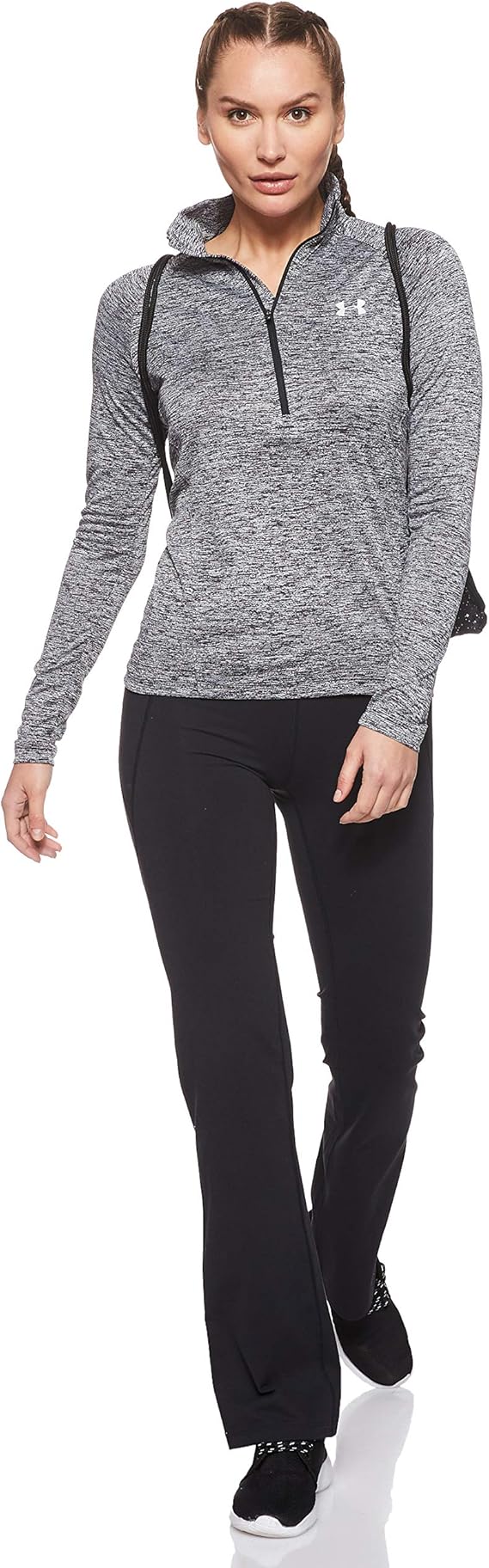 The ½ zip design of this jacket allows for easy on and off, while the stand-up collar provides added protection against the elements. The unique twist detail adds a touch of style to the jacket, making it a fashionable choice for both the gym and everyday activities. The relaxed fit of the UA Tech™ Twist ½ Zip allows for a full range of motion, making it ideal for layering over workout clothes or wearing on its own as a lightweight outer layer.