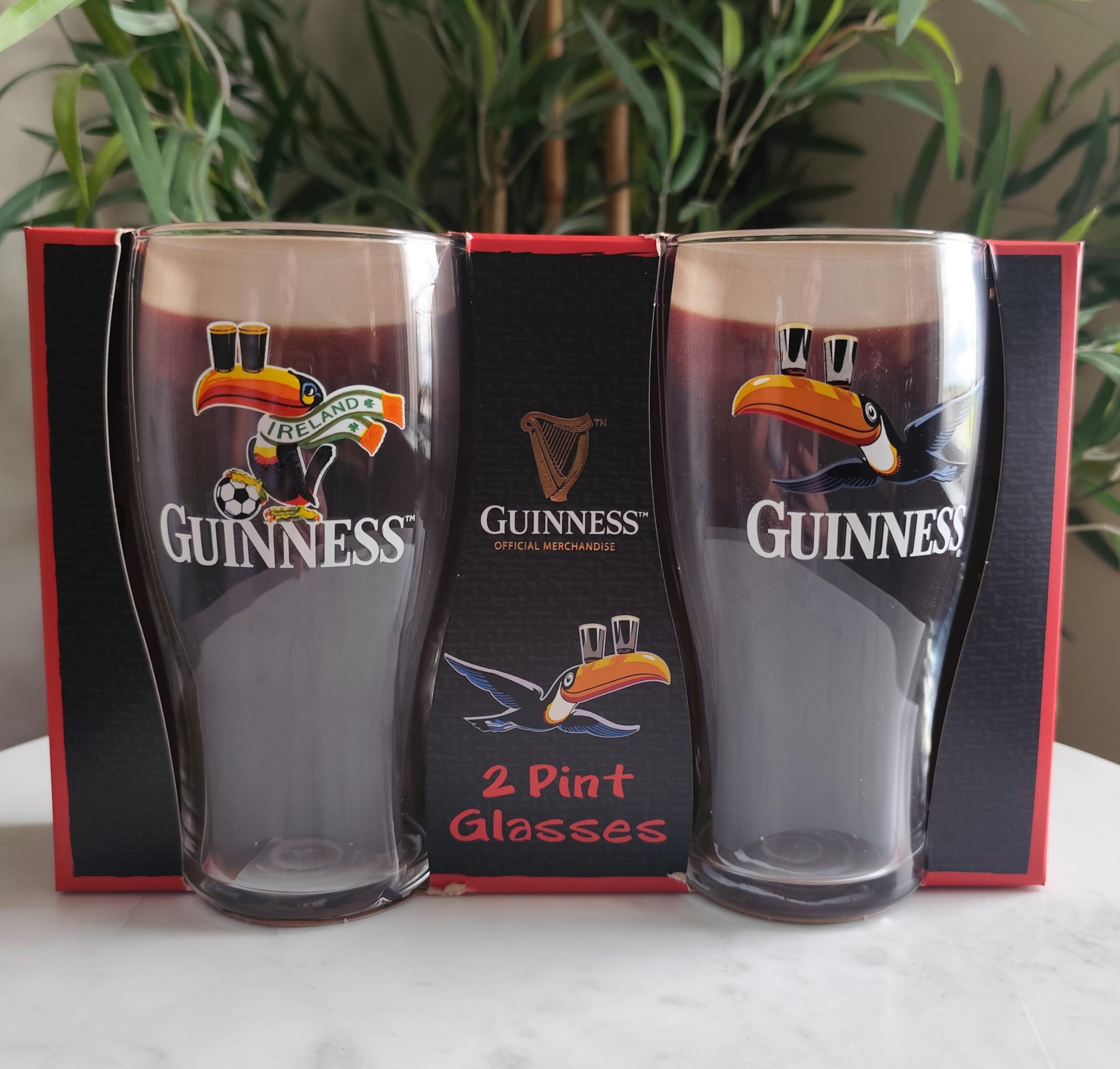Guinness Lot de 2 verres à bière officiels – Toucan de football et toucan volant – Lot de 2 verres à bière irlandaise
