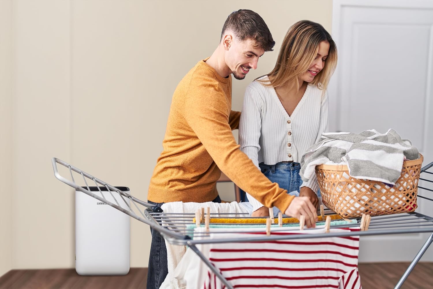 eeese Anna Dehumidifier next to drying laundry