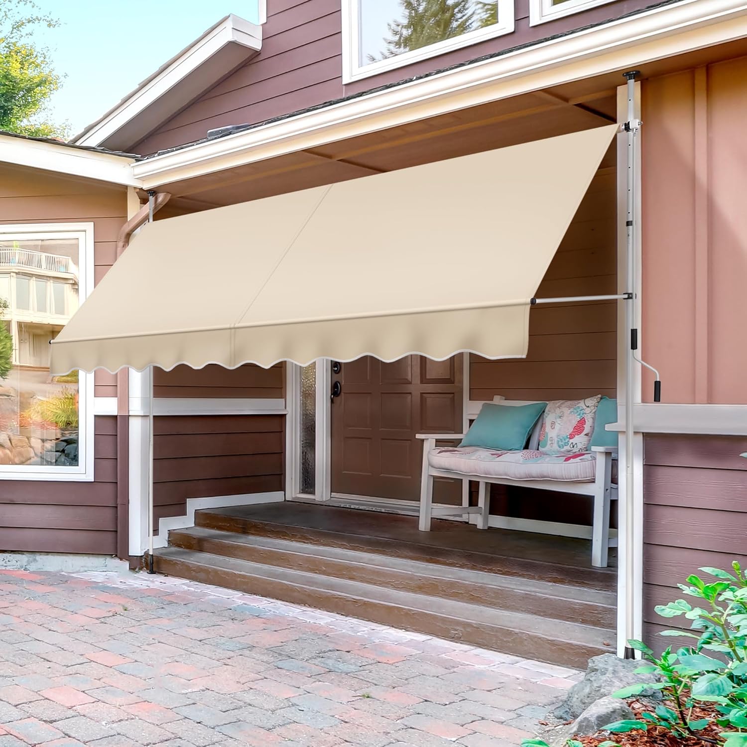 Yaheetech 300 cm Manual Retractable Awning installed on a house porch, providing shade over a bench.