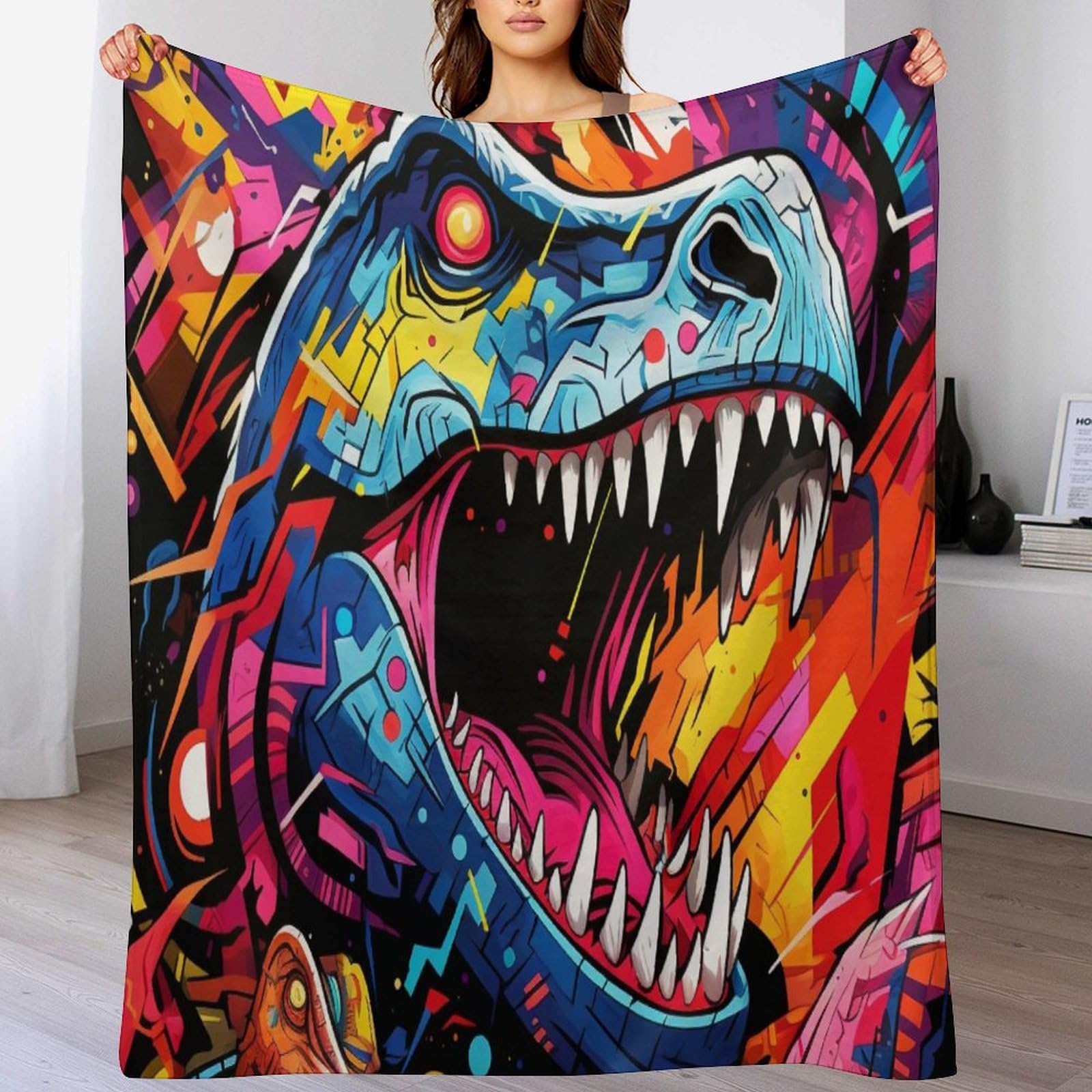 Couverture dinosaure douce pour moments cocooning et sieste sur le canapé 100x130