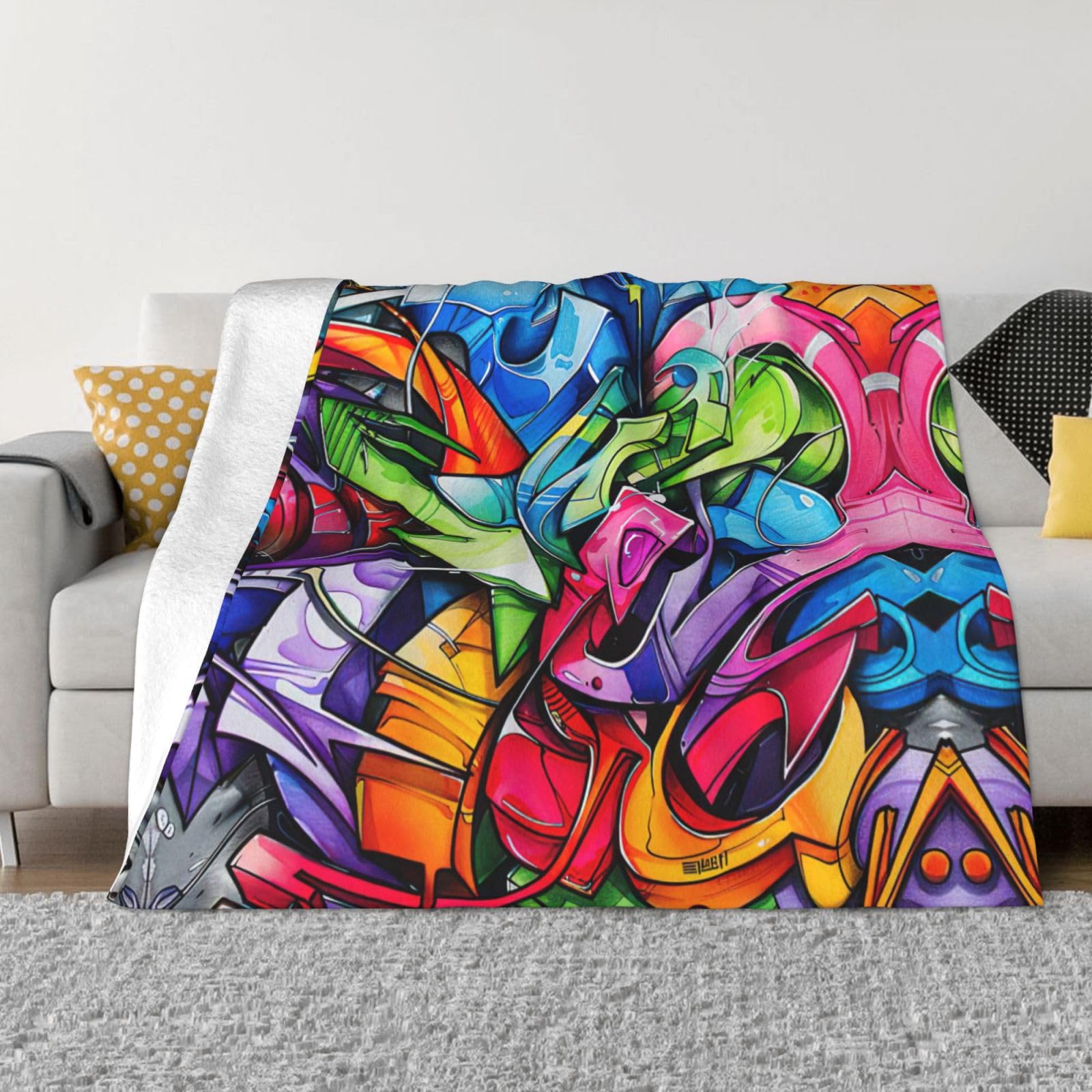 Couverture douce graffiti contre le froid au lit ou sur le canapé