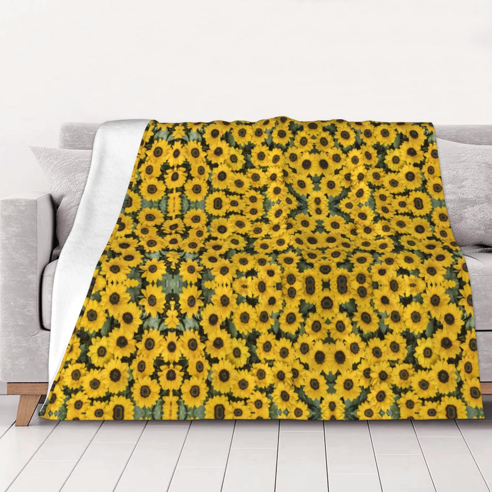 Couverture plaid tournesol pour cocooning sur le canapé du salon