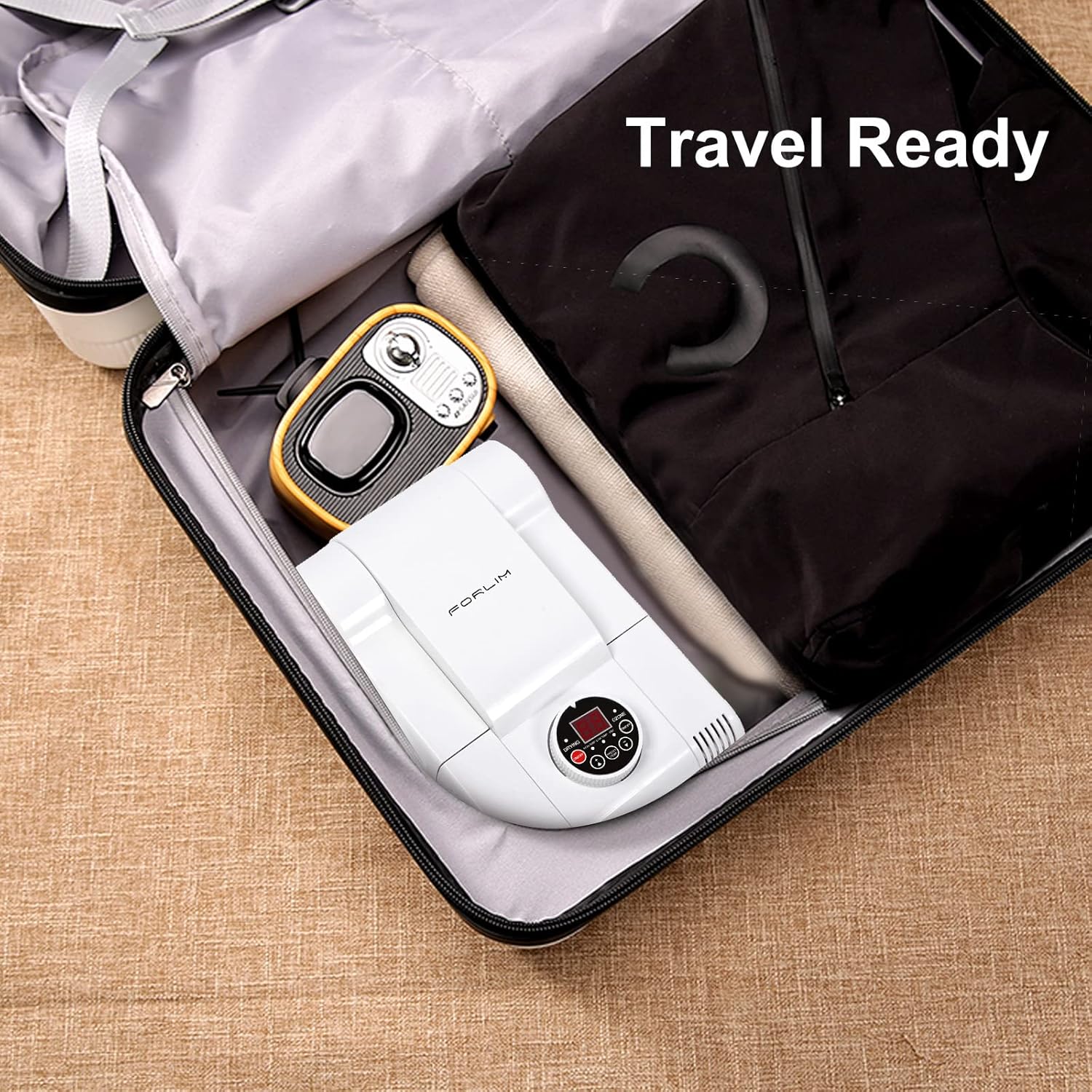 FORLIM boot dryer folded compactly and placed inside a travel bag.