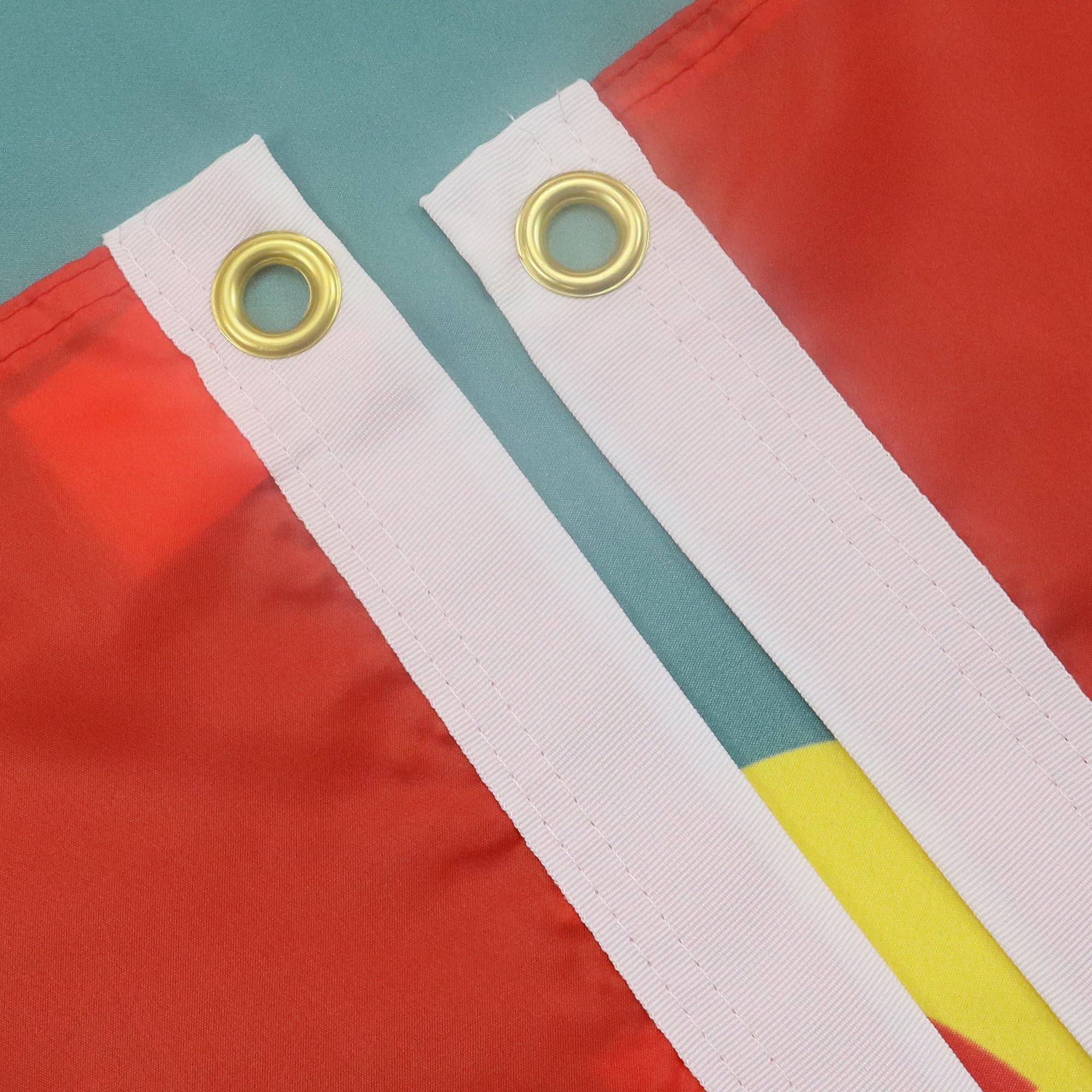 The AZ FLAG Grenada Flag, measuring 2x3 feet, features a 100D polyester construction for vivid colours and durability.
