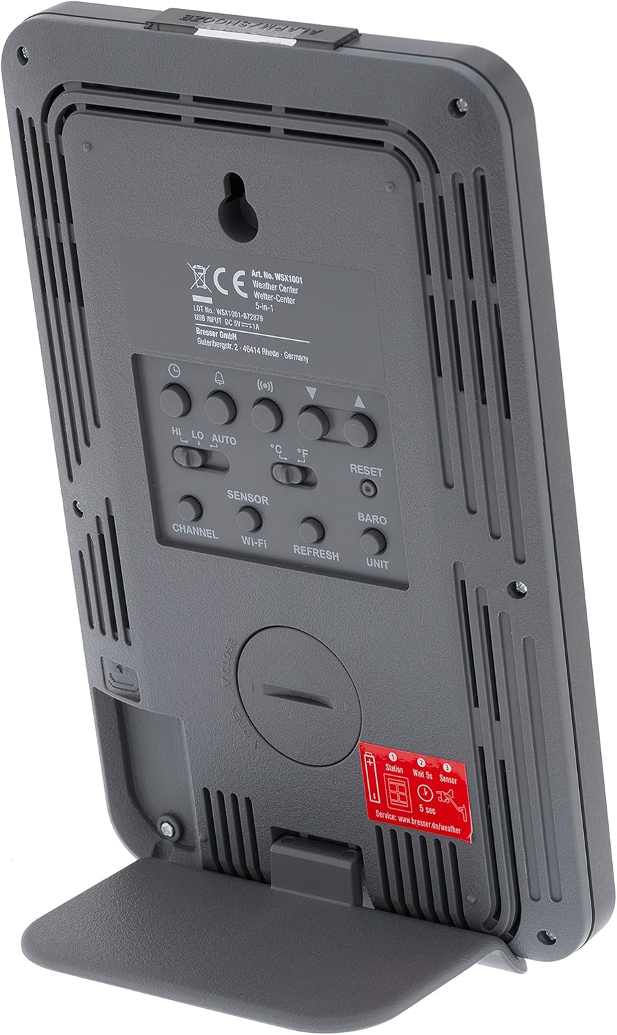 Zadní view of the Explore Scientific weather station display unit, showing battery compartment and control buttons