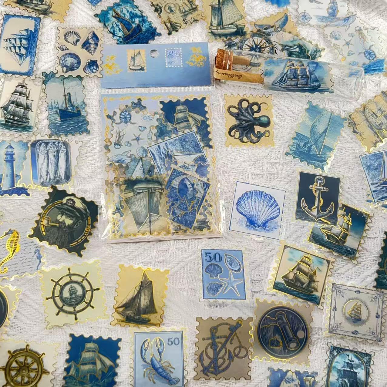 50PCS Vintage Blue Nautical Stamp Stickers with Gold Foil Edge — Clear Ocean Scrapbook Stickers, Maritime Sailboat Lighthouse Compass Seaside Decals for Journals, Planners & Crafts