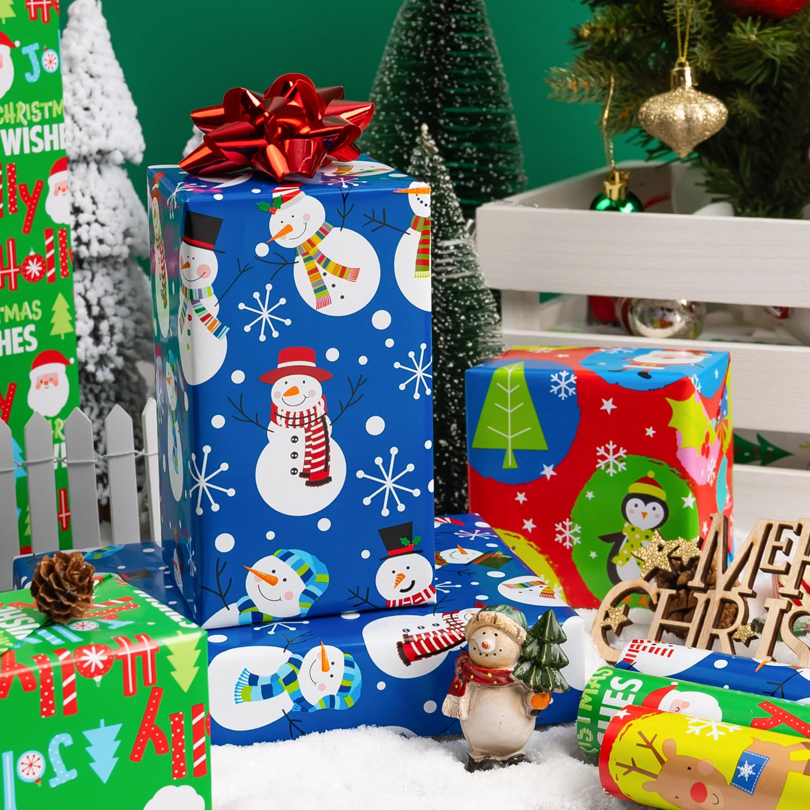 Yarcony Divertido paquete de 3 papeles de regalo de Navidad, 17 pulgadas x 10 pies por rollo, vibrante Papá Noel, muñeco de nieve, pingüino, papel de regalo surtido de invierno para Navidad