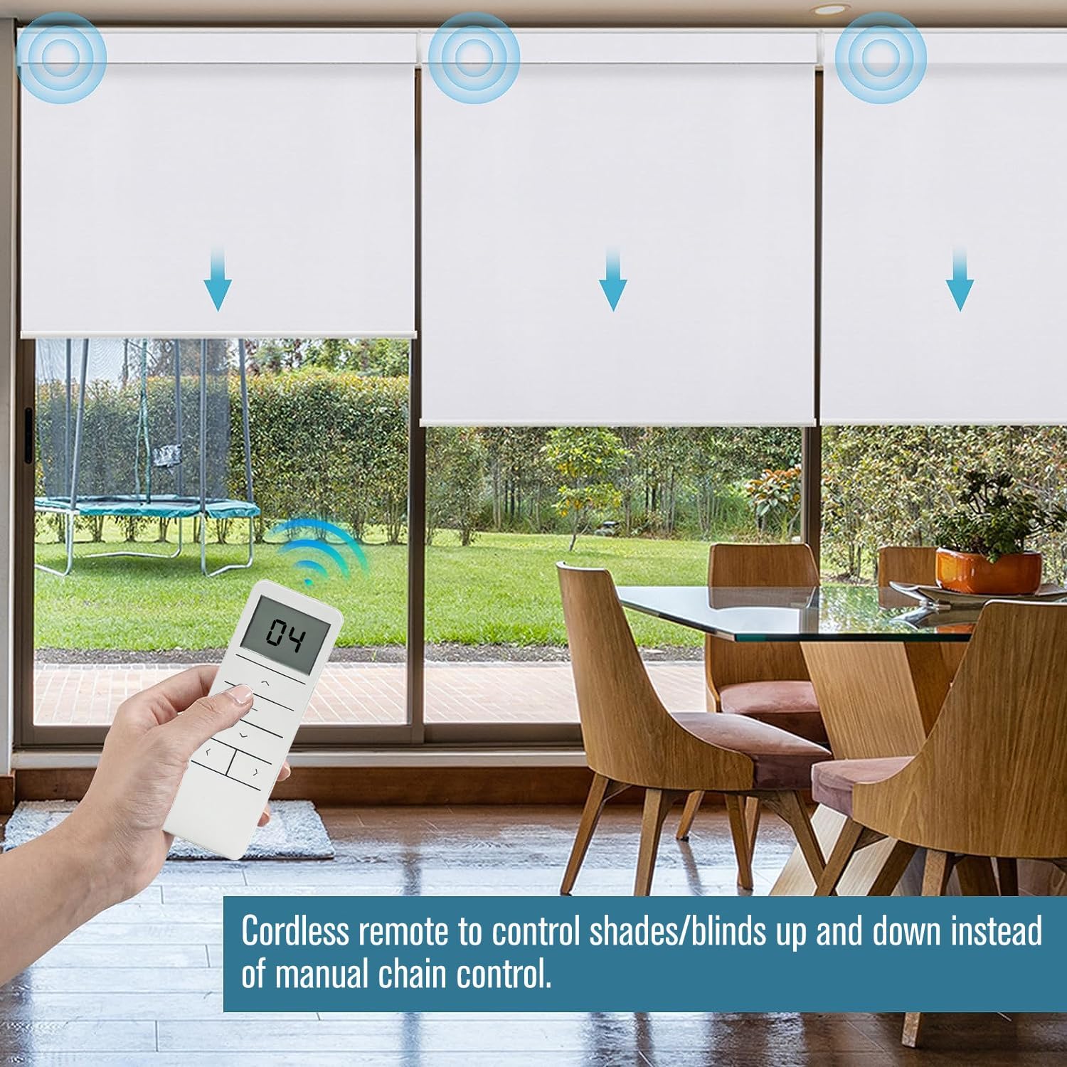 Person using the DC2702 remote to control multiple motorized roller shades in a dining room