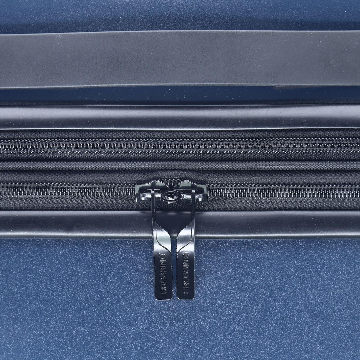 Close-up of the luggage zippers, showing the double zipper design for enhanced security.