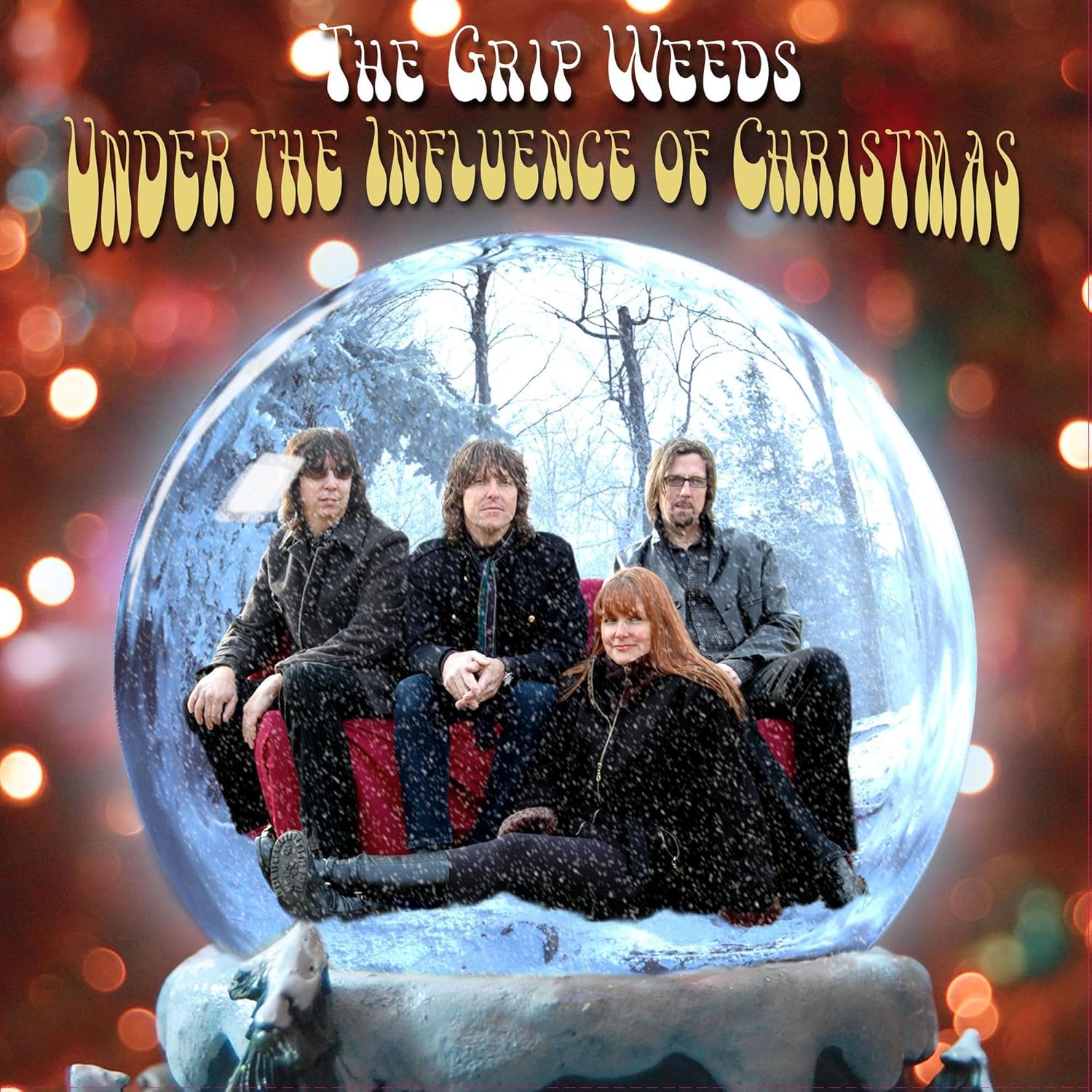 UNDER THE INFLUENCE OF CHRISTMAS por The Grip Weeds — capa do álbum