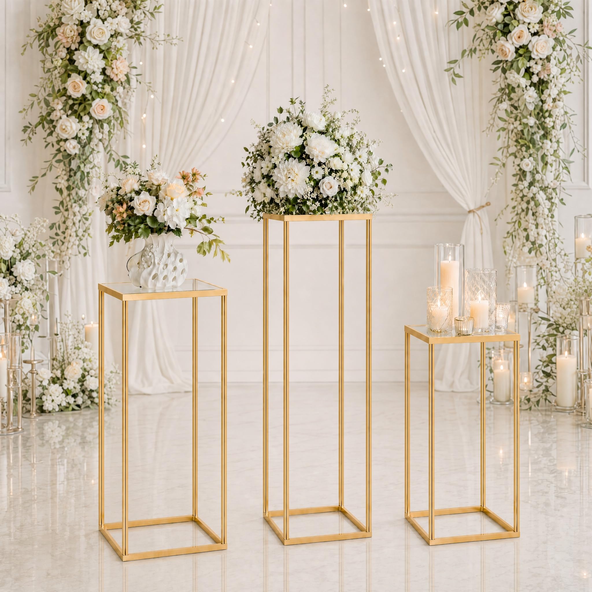 Photo 1 of Hafyow 3PCS Square Metal Pedestal Stands, Gold Display Columns for Party Decorations, Wedding Cake Table Stands with Removable Acrylic Top, Sturdy Iron Nesting Riser for Flowers, Vases, and Dessert Displays (23.6", 31.5", 39.3" Heights)