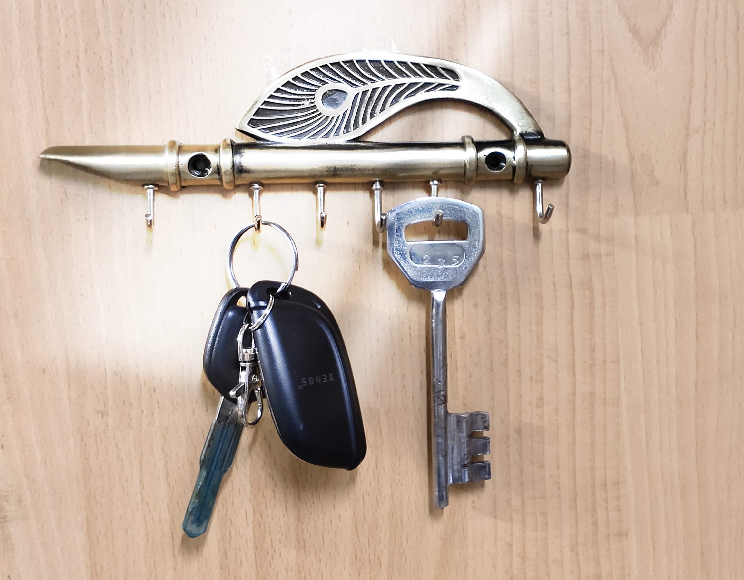 Prince Home Decor & Gifts Lord Krishna's Flute and Peacock Quills Wall Hanging Key Holder Stand (18.5 X 6 cm, Zinc)