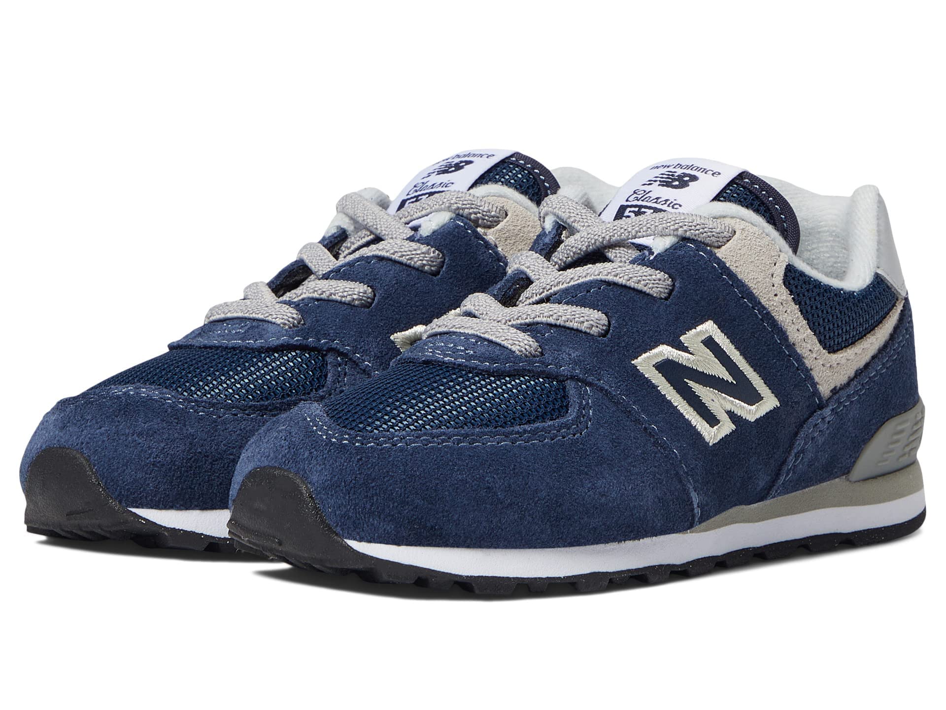 New Balance boys 574 V1 Lifestyle Bungee Sneaker, Navy/White, 5.5 Toddler US