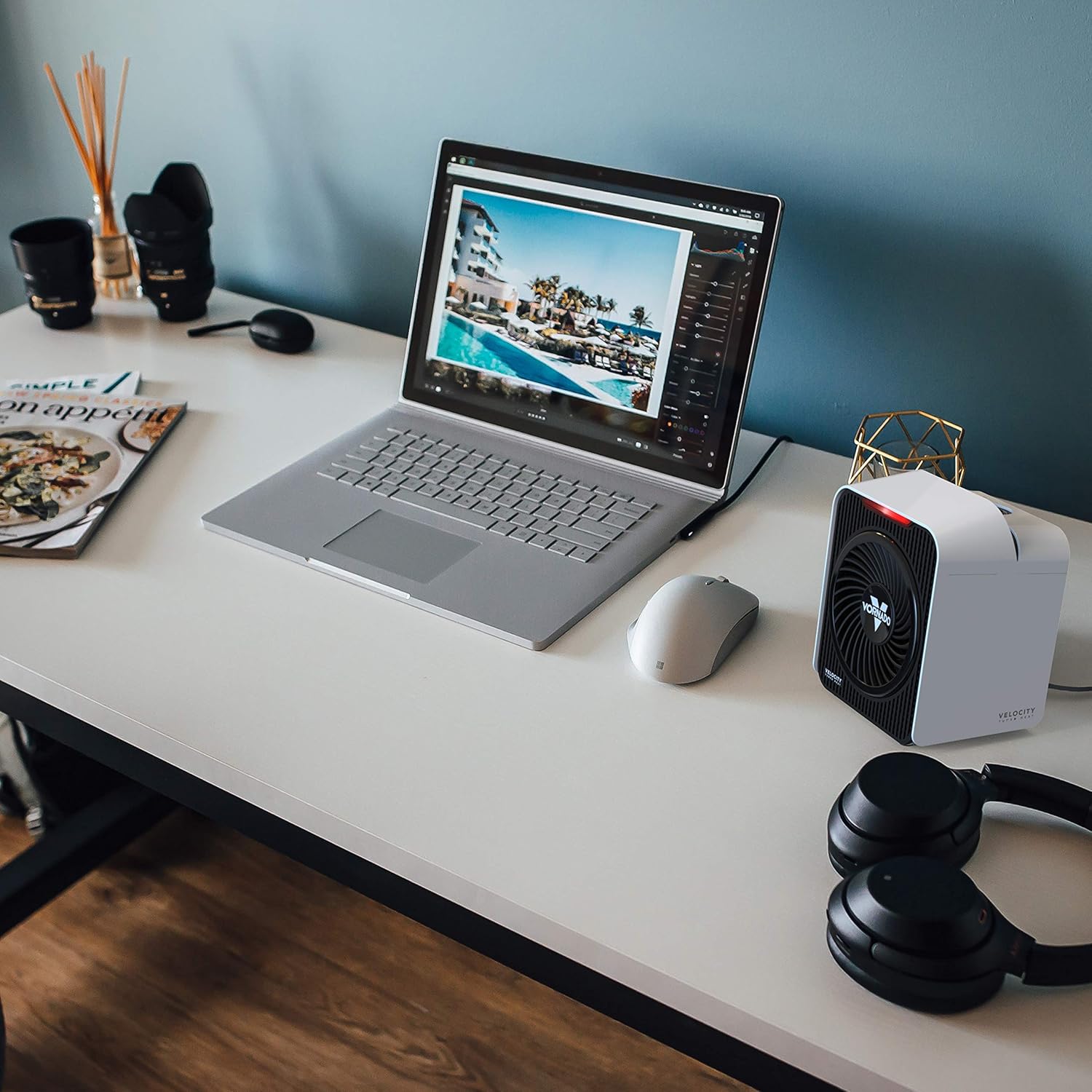 Vornado Velocity 1 Personal Space Heater on a desk next to a laptop