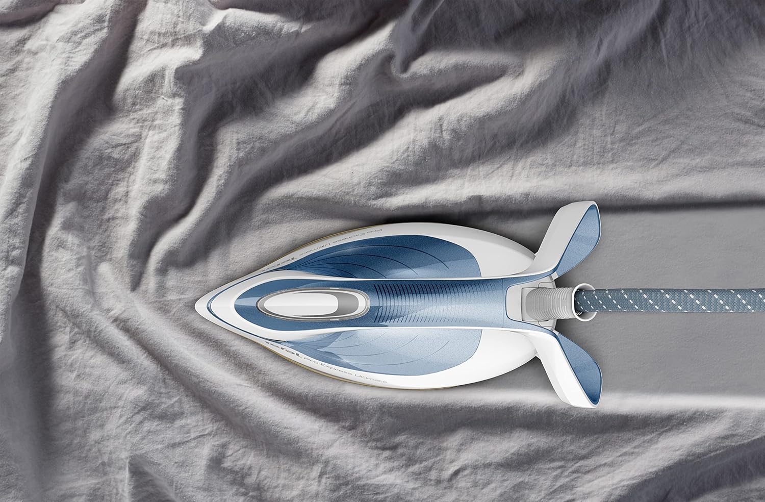 Hand removing the Calc Collector from the Tefal Pro Express Ultimate GV9710