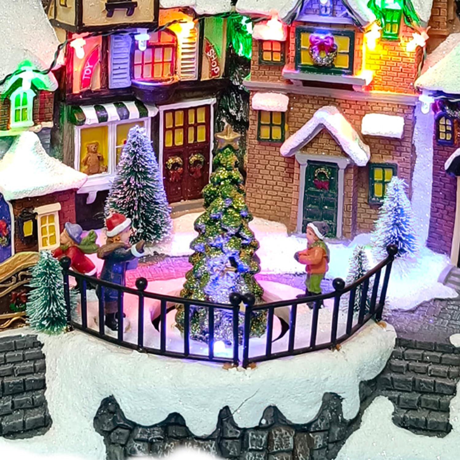 Avilia Pueblo de Navidad Animado con iluminación LED y música navideña – Ideal para Decorar de Forma única y Moderna tu casa – Fabricado con Materiales Resistentes – 31 x 38 x 22 cm