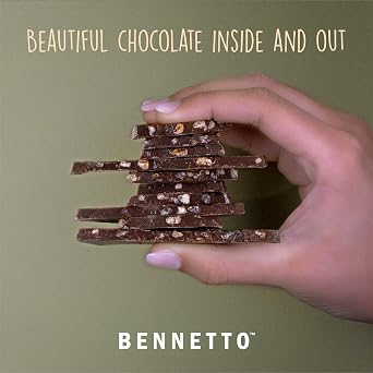 Bennetto Orange with Chilli. Dark chocolate with orange zest and a hint of chilli. 60% cocoa. Certified organic, Fairtrade, and net climate positive. 3 x 80g Bars