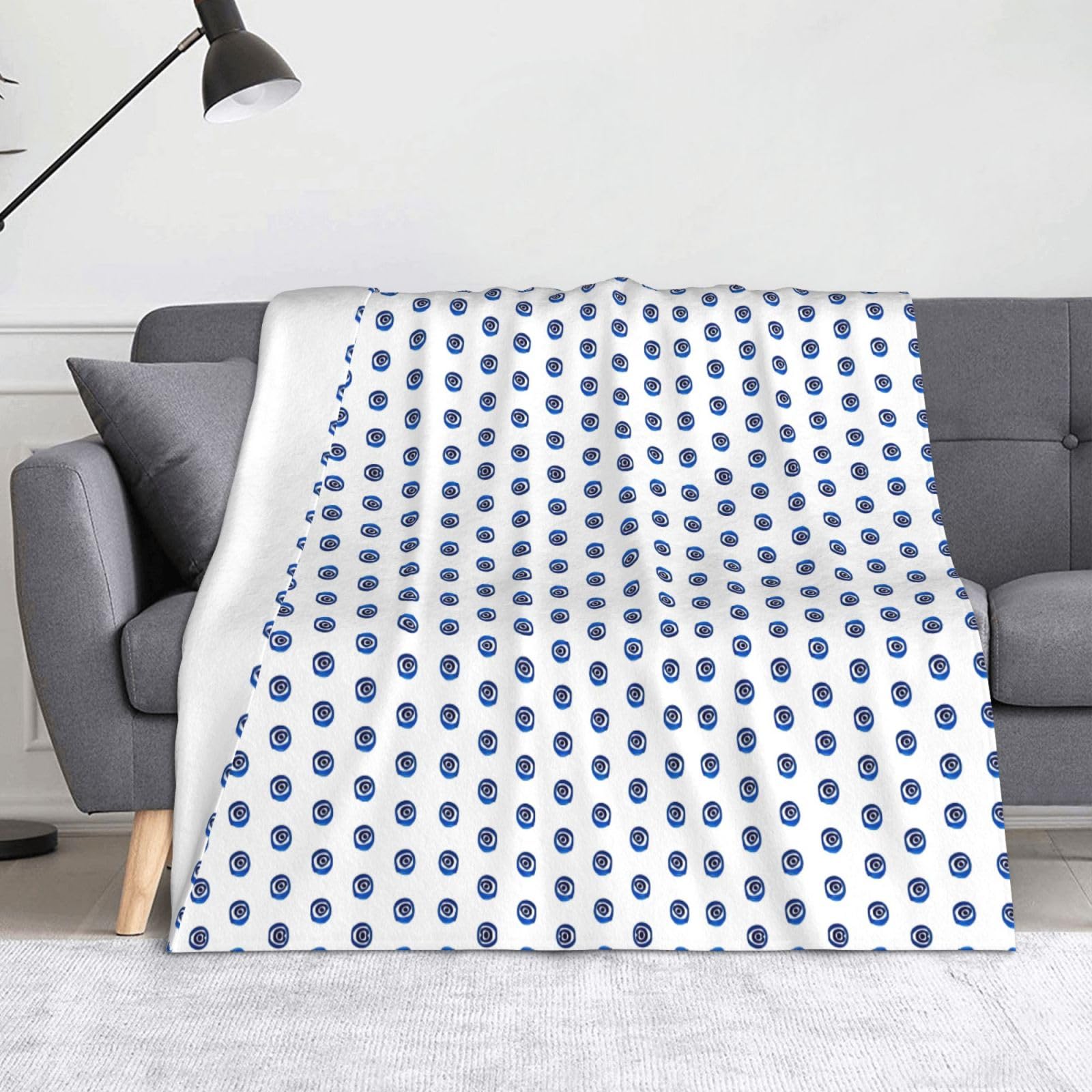 Couverture respirante en flanelle yeux maléfiques plaid peluche doux