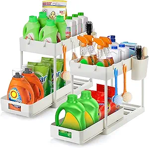 Ravinte 2 Pack Pull Out Under Sink Organizer 2 Tier Multi Purpose Sink Organizers Storage For Bathroom Kitchen Sink Storage Organizer With Hook & Hanging Cup White Sliding Cabinet Organizer