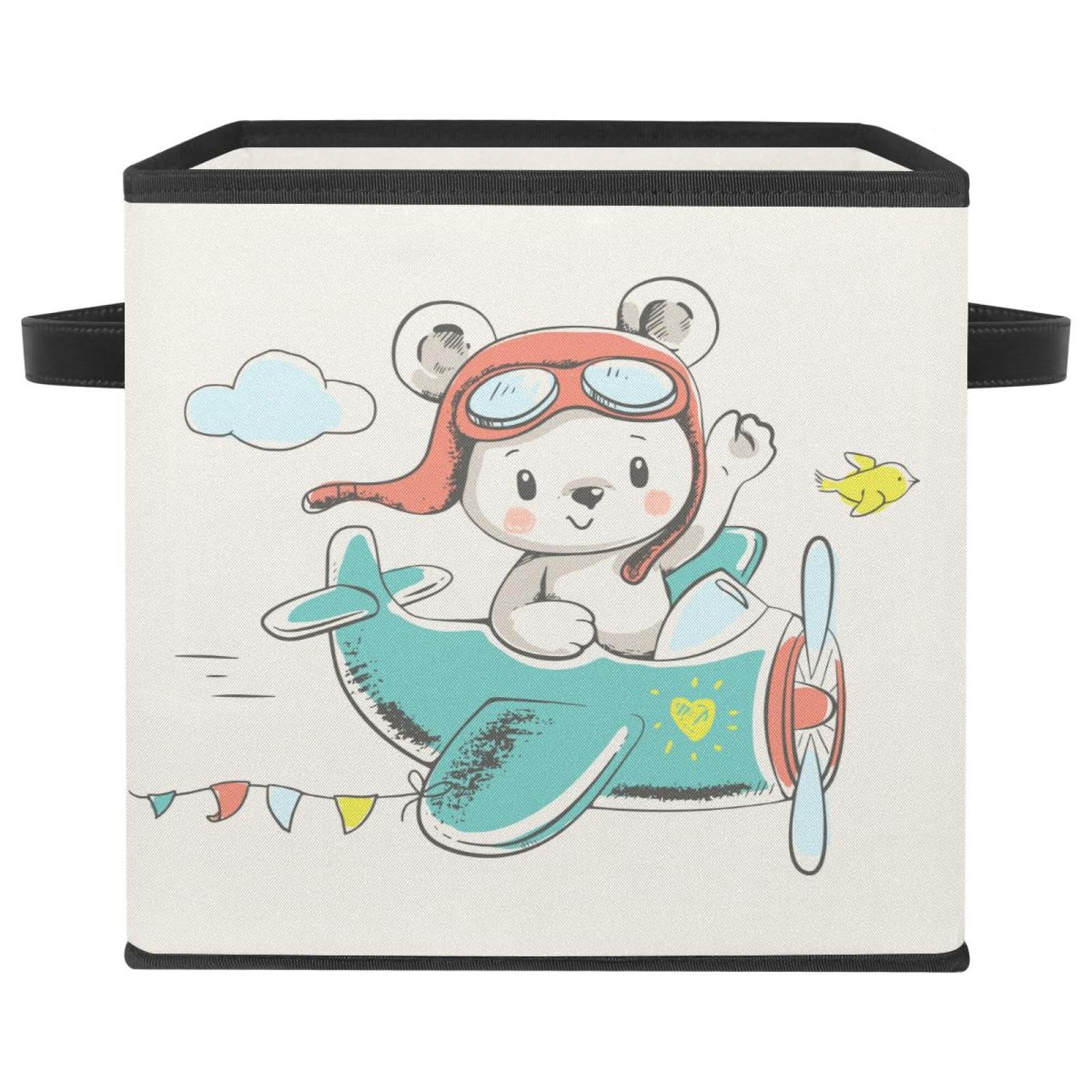 Chambre d'enfant épurée avec la boîte de rangement ours volant en avion