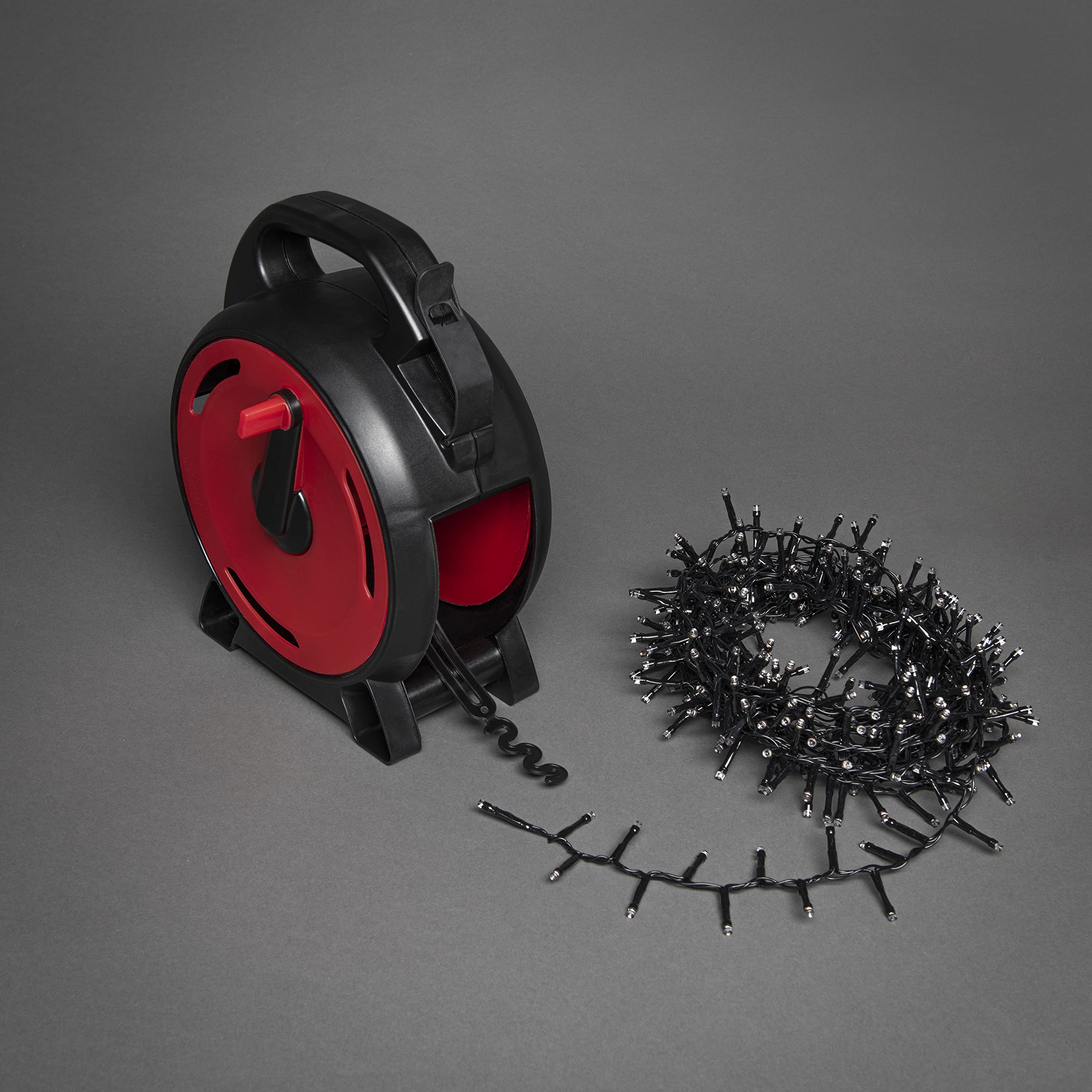 Konstsmide Micro LED Compactlights 3850-800 - Cable retráctil (1200 diodos ámbar, 30 V, exterior (IP44), cable negro)