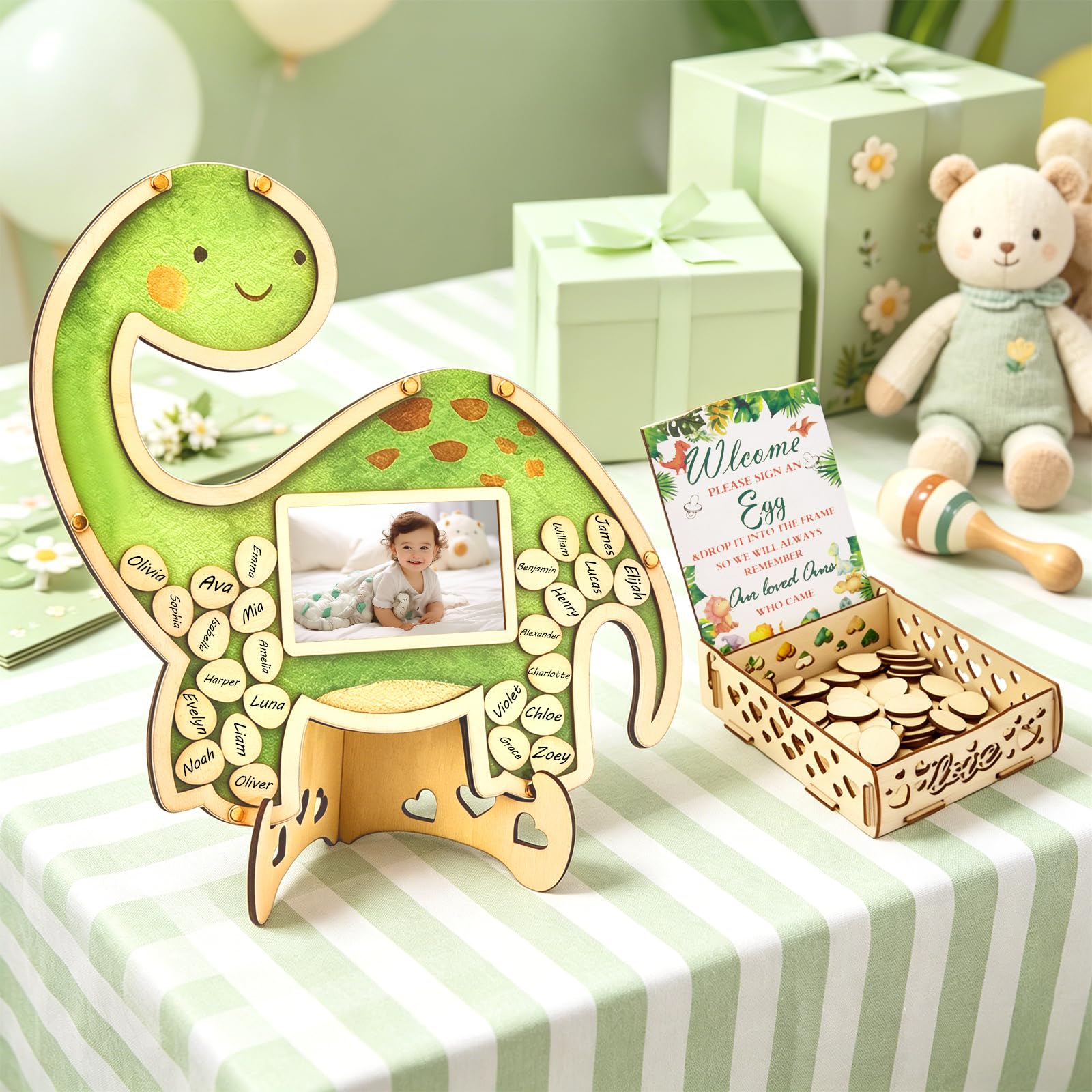 Decoración de fiesta de bebé con marco de fotos de madera y libro de visitas