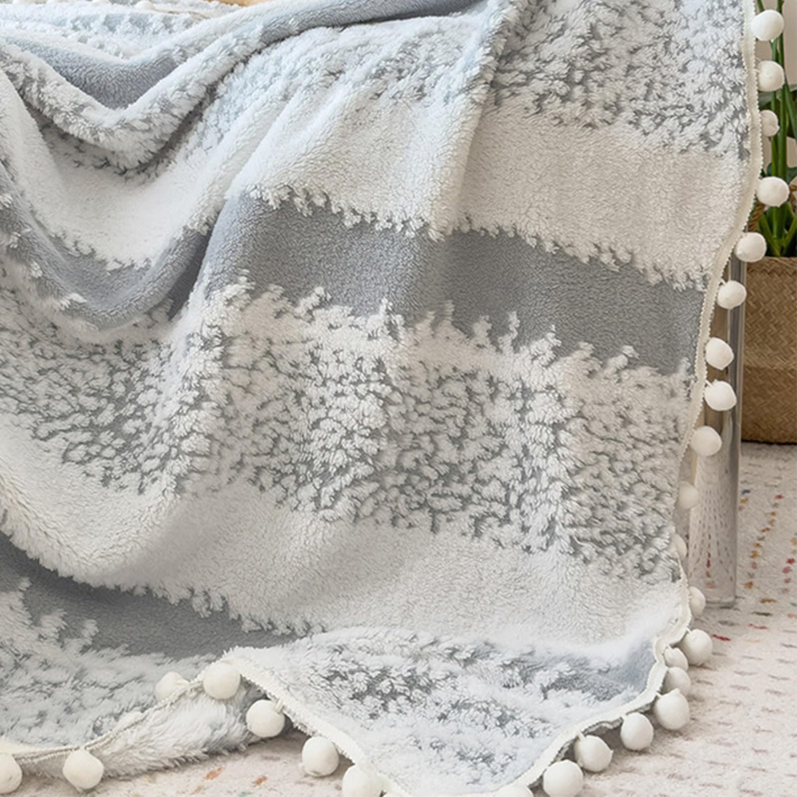 Couverture de Noël jacquard pour soirées d'hiver cocooning plaid doux et chaud gris au salon