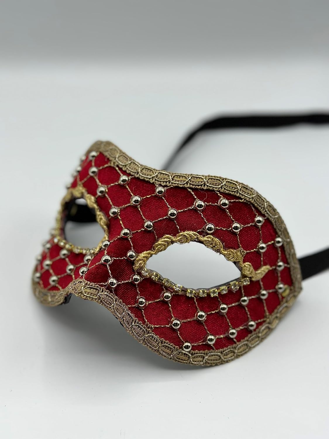 Masquerade ball mask in red.