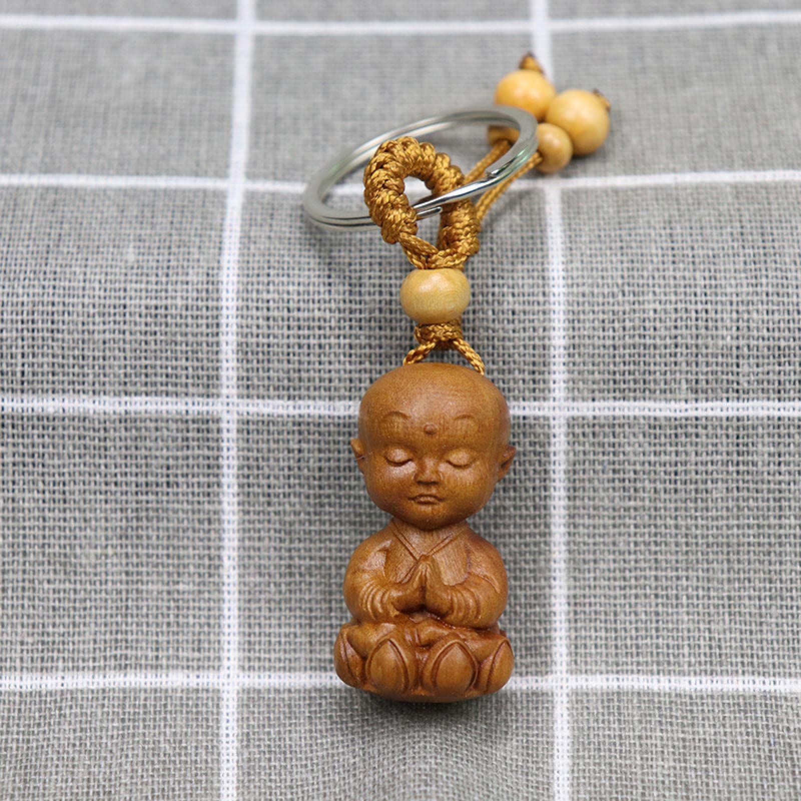 Amazon｜桃木彫り釈迦仏キーホルダー木製観音菩薩キーホルダー付工芸品